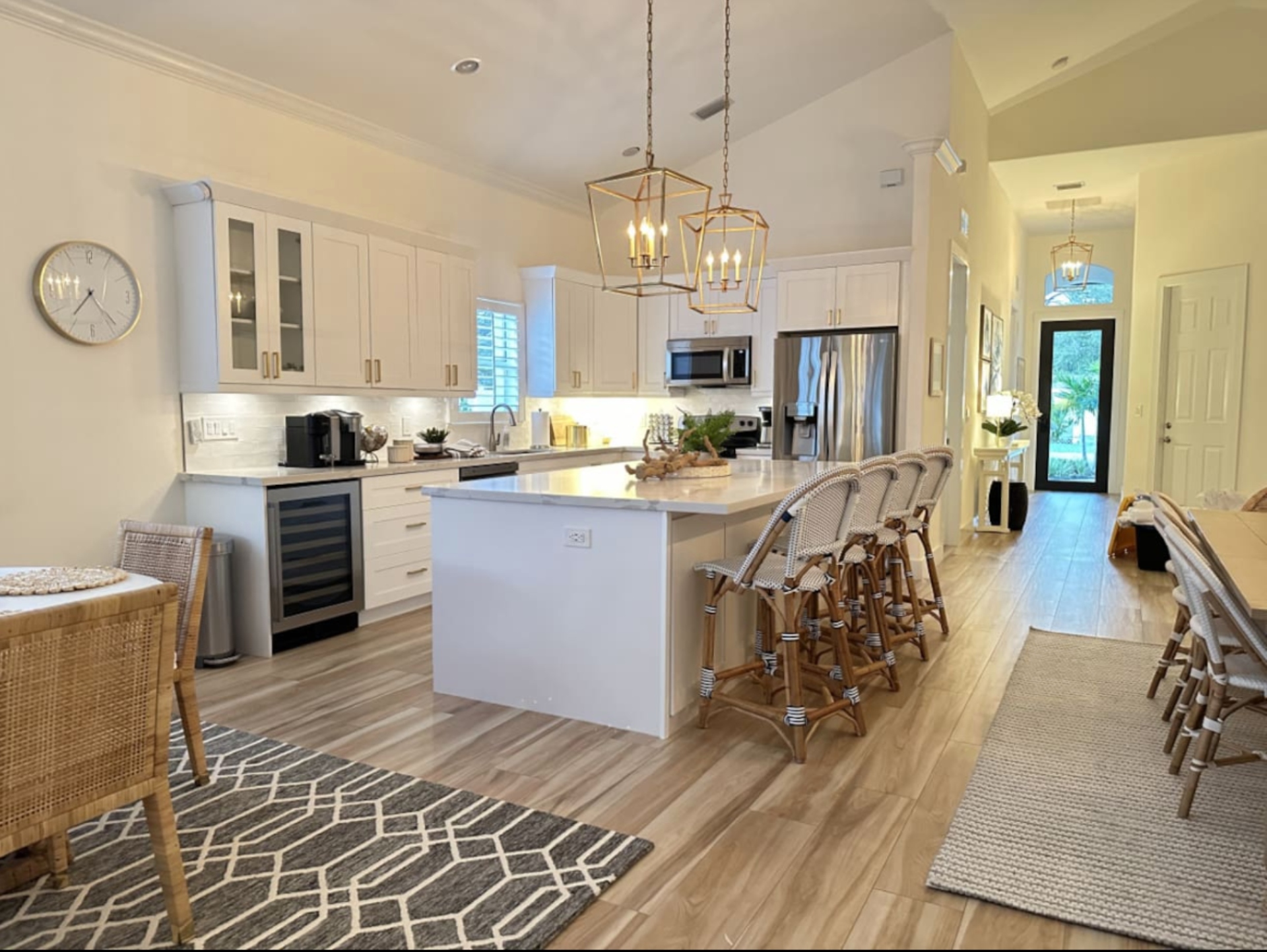 Fully Stocked Kitchen w/ Bar Seating and Two Tables!