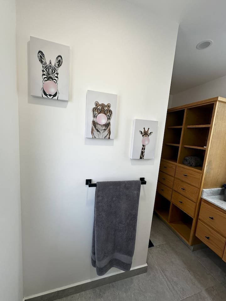 Relax in the master bath, equipped with all the essentials including a handy first aid kit for your peace of mind.