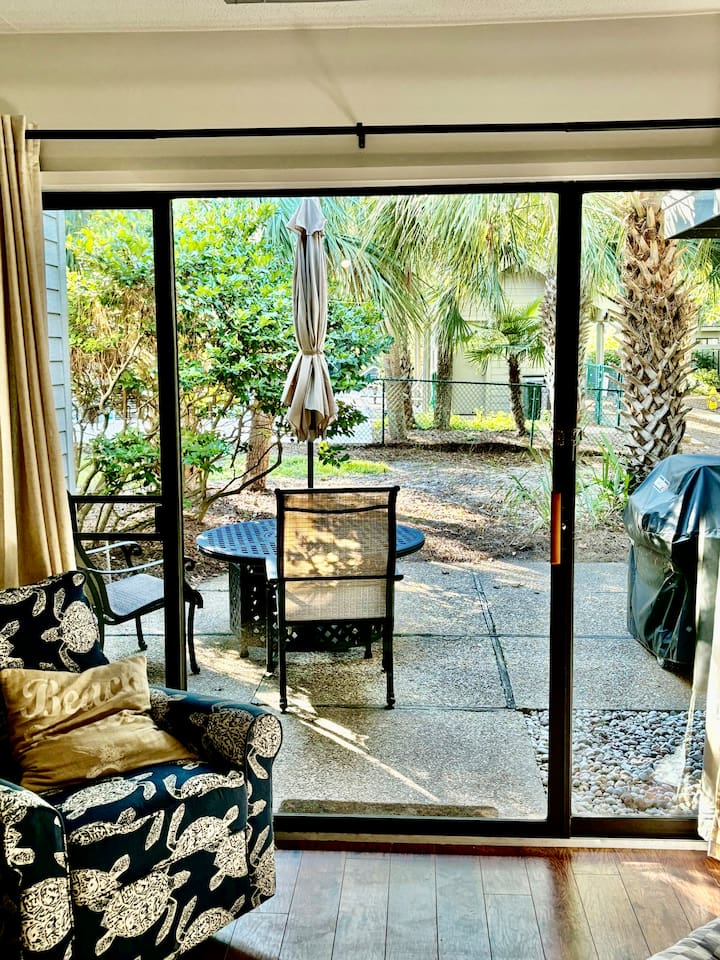 Patio doors with outdoor dining and grill