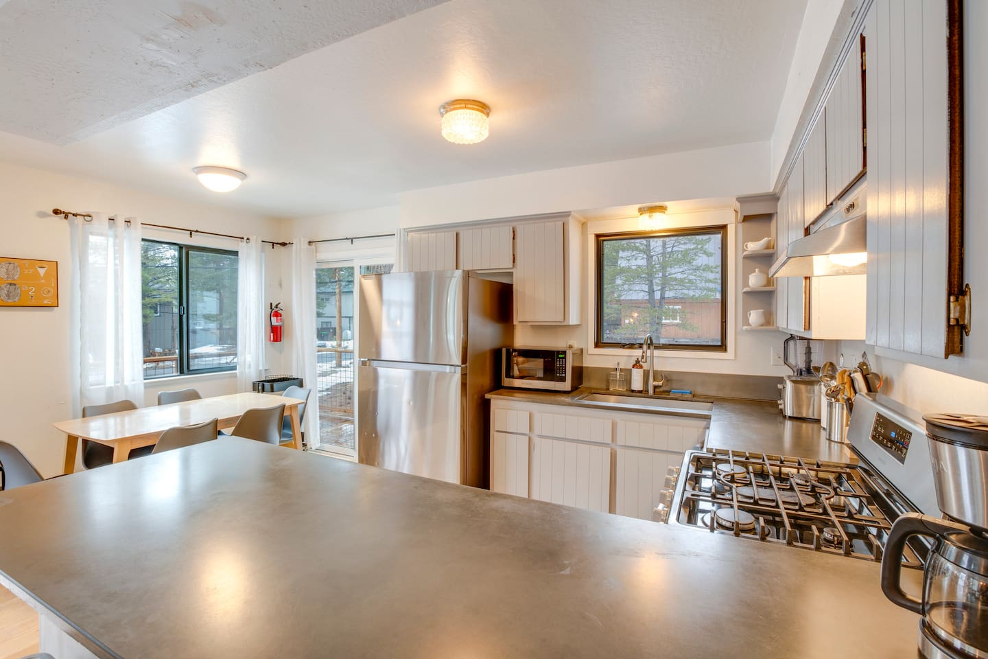 Quartz countertops and stainless steel appliances. 