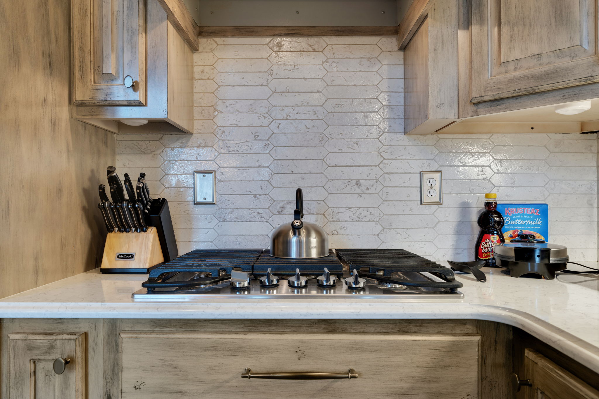 Tea kettle for boiling water or making tea. Waffle iron also available.