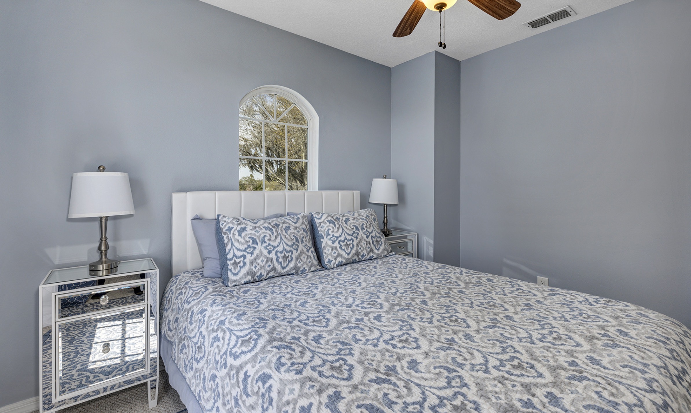 Queen size bed and custom closet with plenty of storage