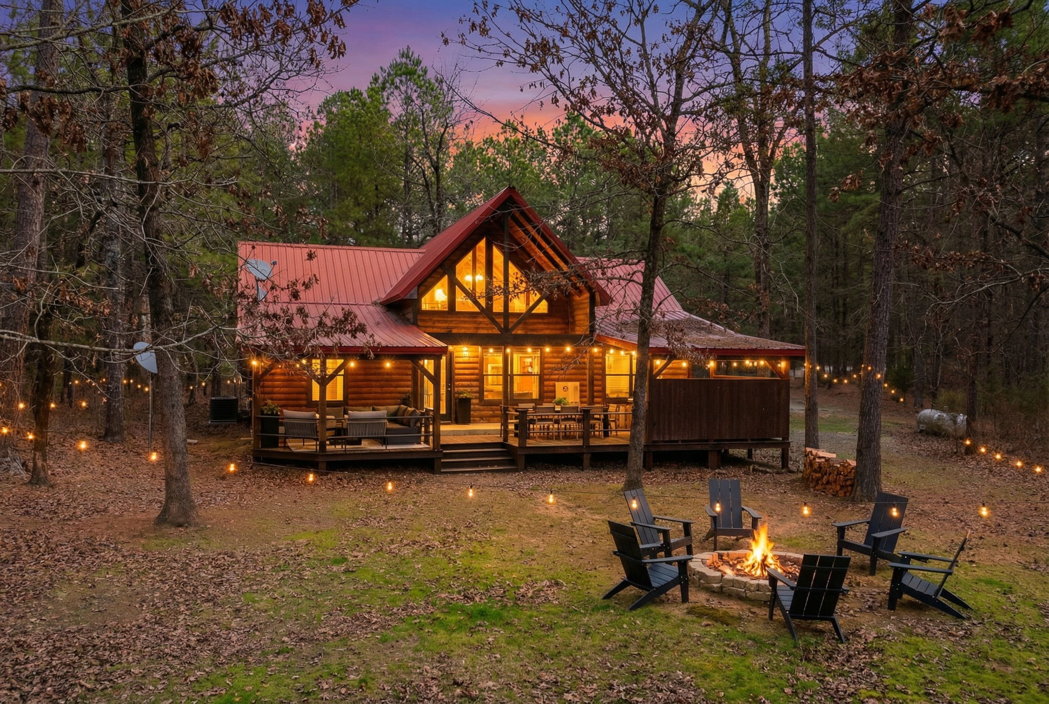 Nestled in the pines with space to breathe, this exterior offers privacy, convenience, and upscale rustic charm all in one inviting setting.