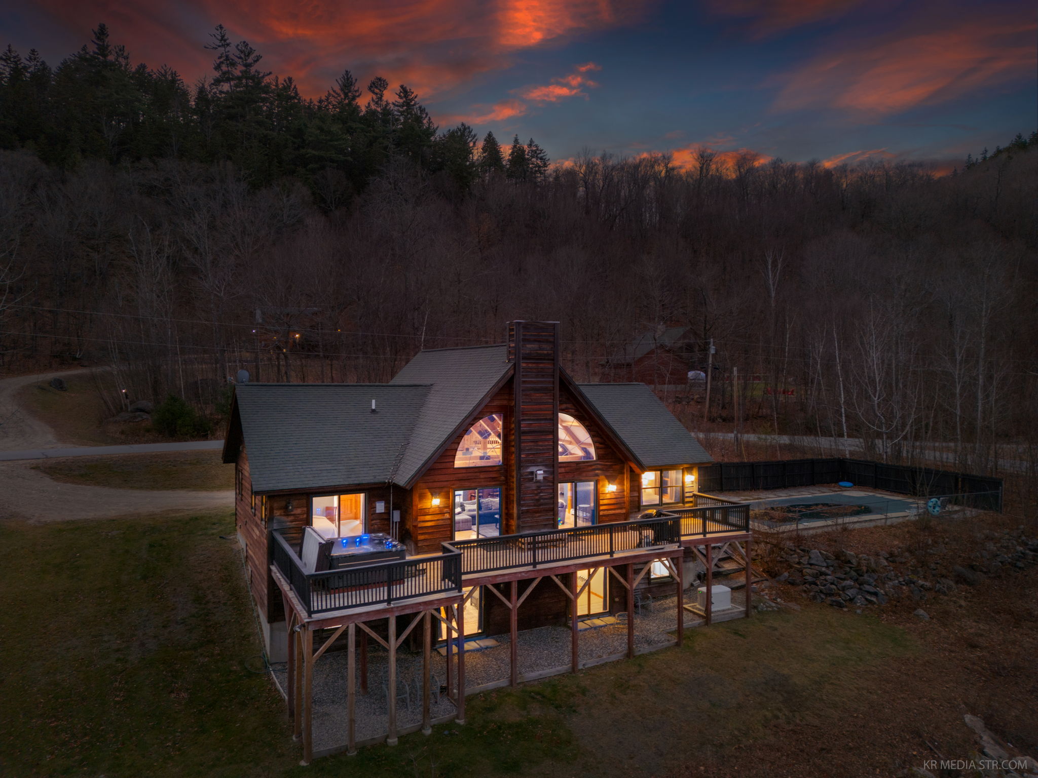 Escape to this stunning mountain cabin with glowing interiors, peaceful surroundings, and total privacy where your whole group can spread out and settle in for a true getaway.
