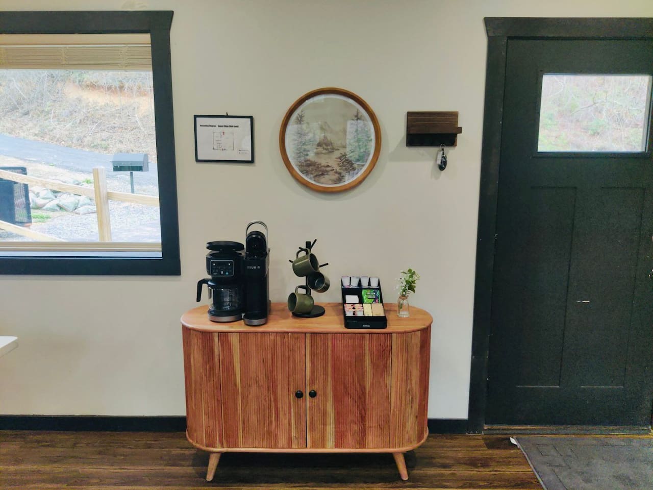 Welcome in and enjoy our coffee station with Keurig, drip coffee, and mugs.