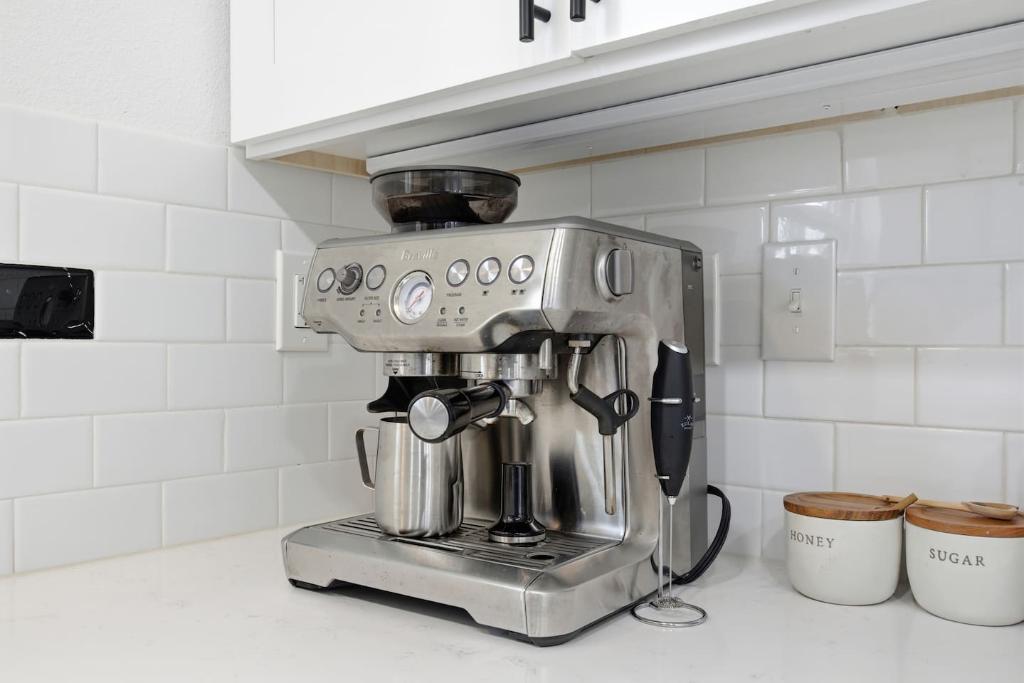 Breville espresso machine and coffee station for morning lattes, cappuccinos, and fresh coffee at home.
