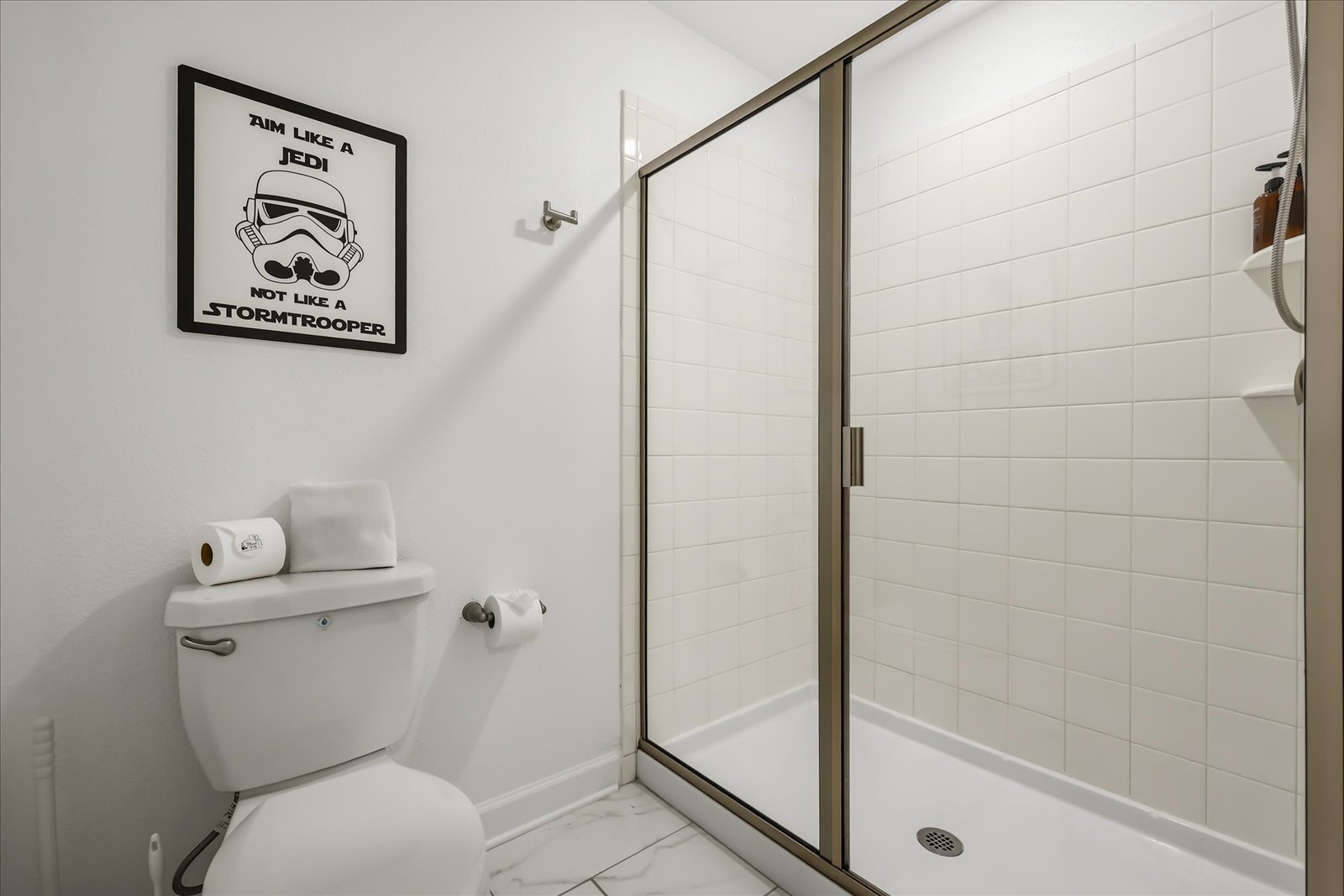 Bathroom shared by Star Wars and Beauty & the Beast bedrooms with an additional hall access door.