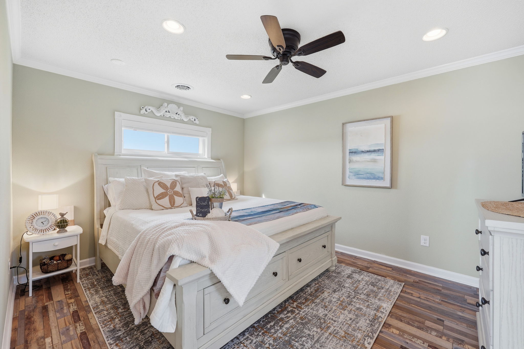 A serene escape featuring plush bedding, privacy, and easy access to the loft lounge.