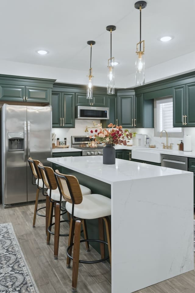 Another view of the spacious kitchen featuring the large island with bar seating—perfect for morning coffee or casual meals.
