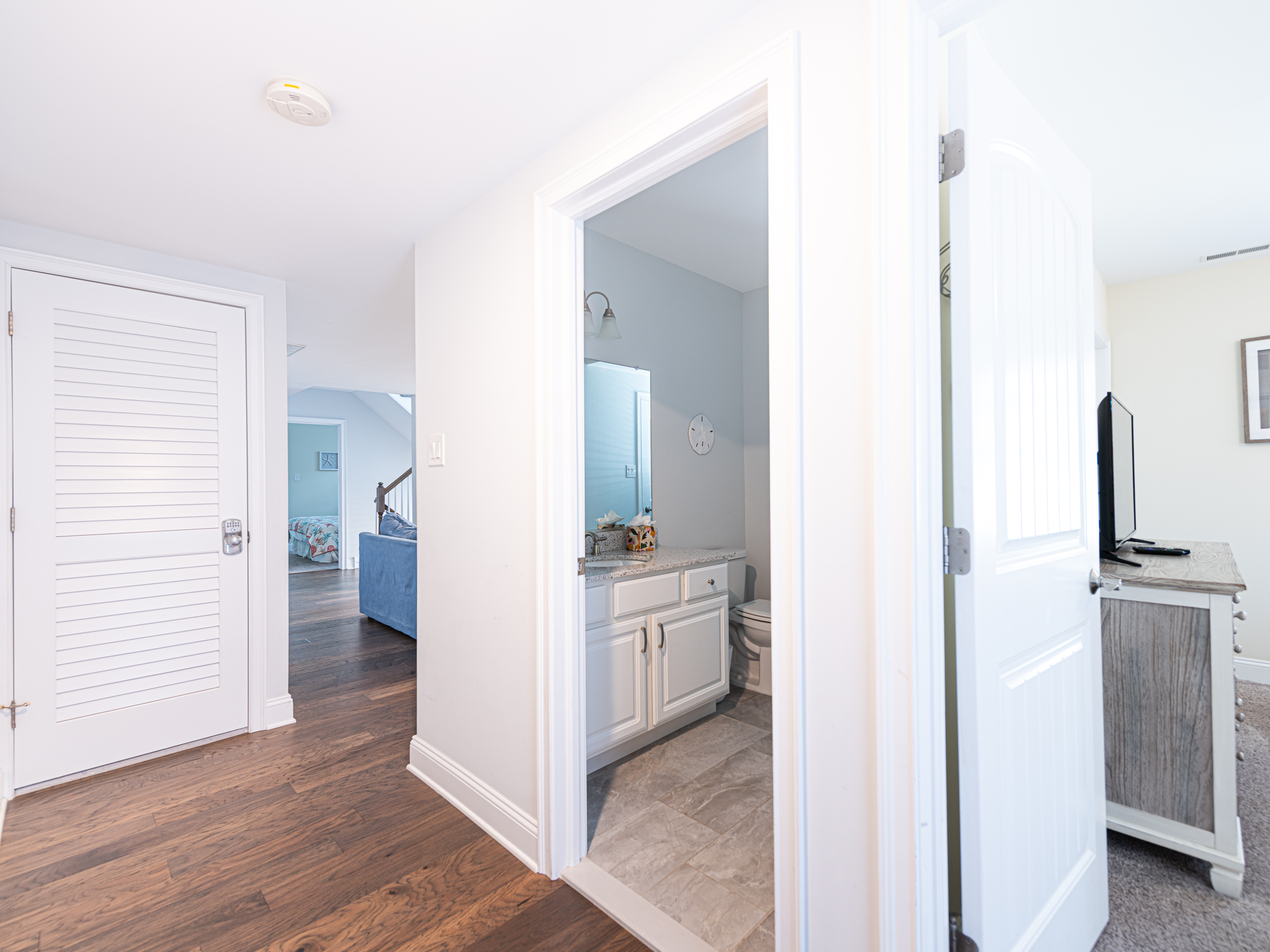 Hall with view of BR 2 and bath