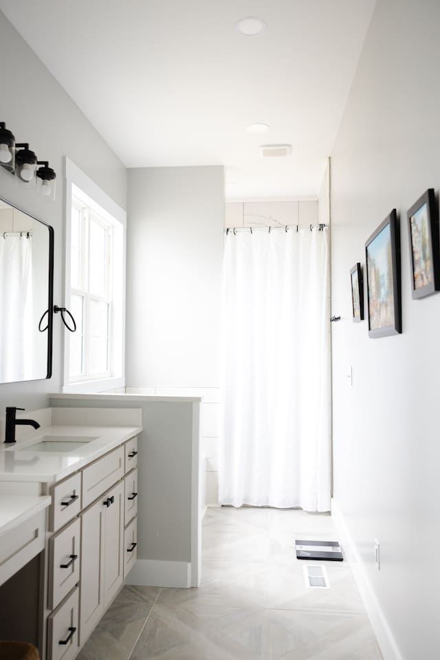 Master bathroom has private water closet, makeup vanity, two sinks, a bathtub, and a large walk-in shower with two shower heads. Amazing water pressure!