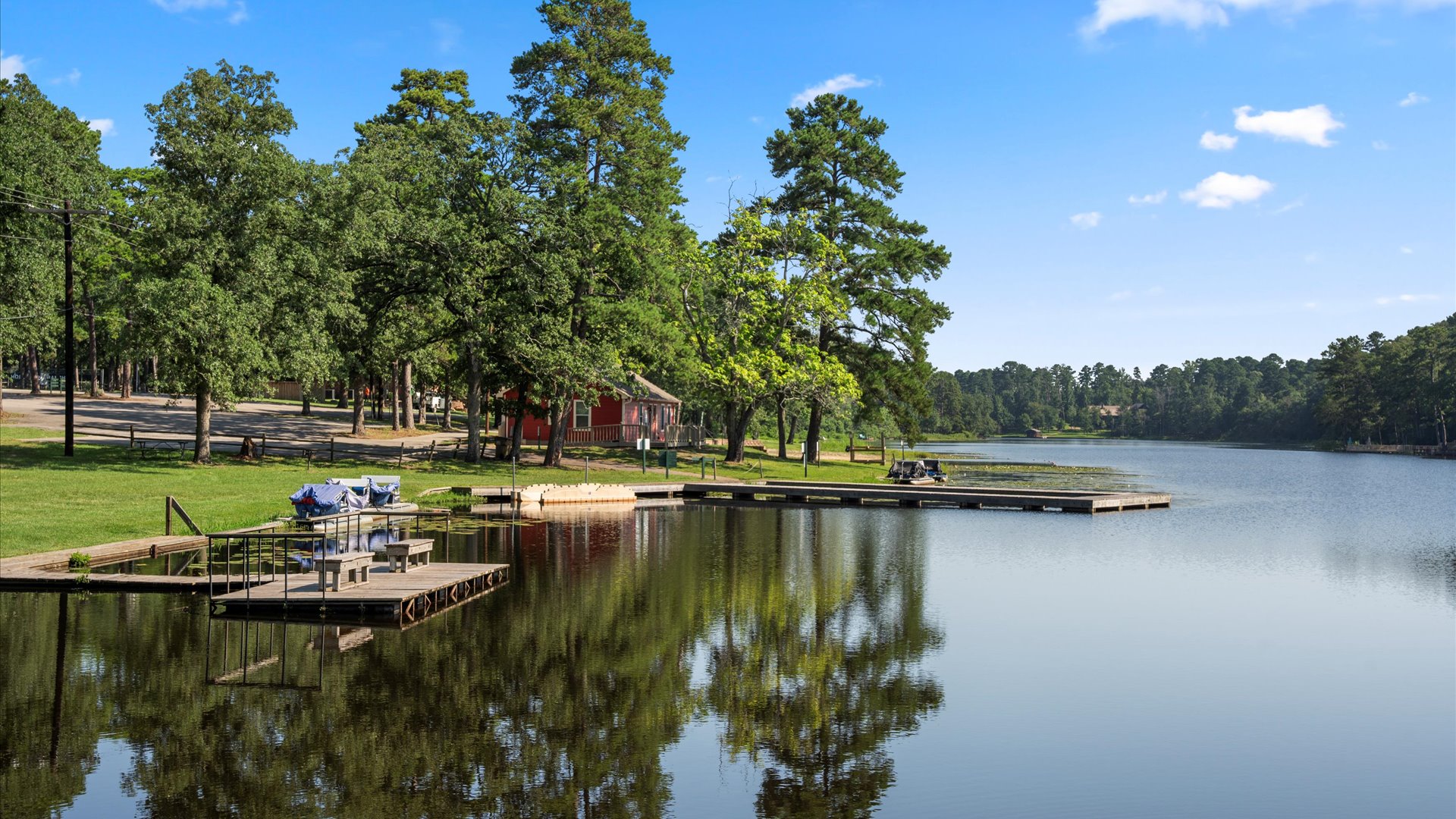 A peaceful spot to cast a line and reel in dinner! This scenic dock offers a relaxing place to fish while enjoying the serene lake views and natural surroundings.