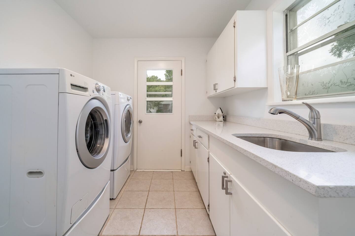 Laundry room with high capcity washer and dryer