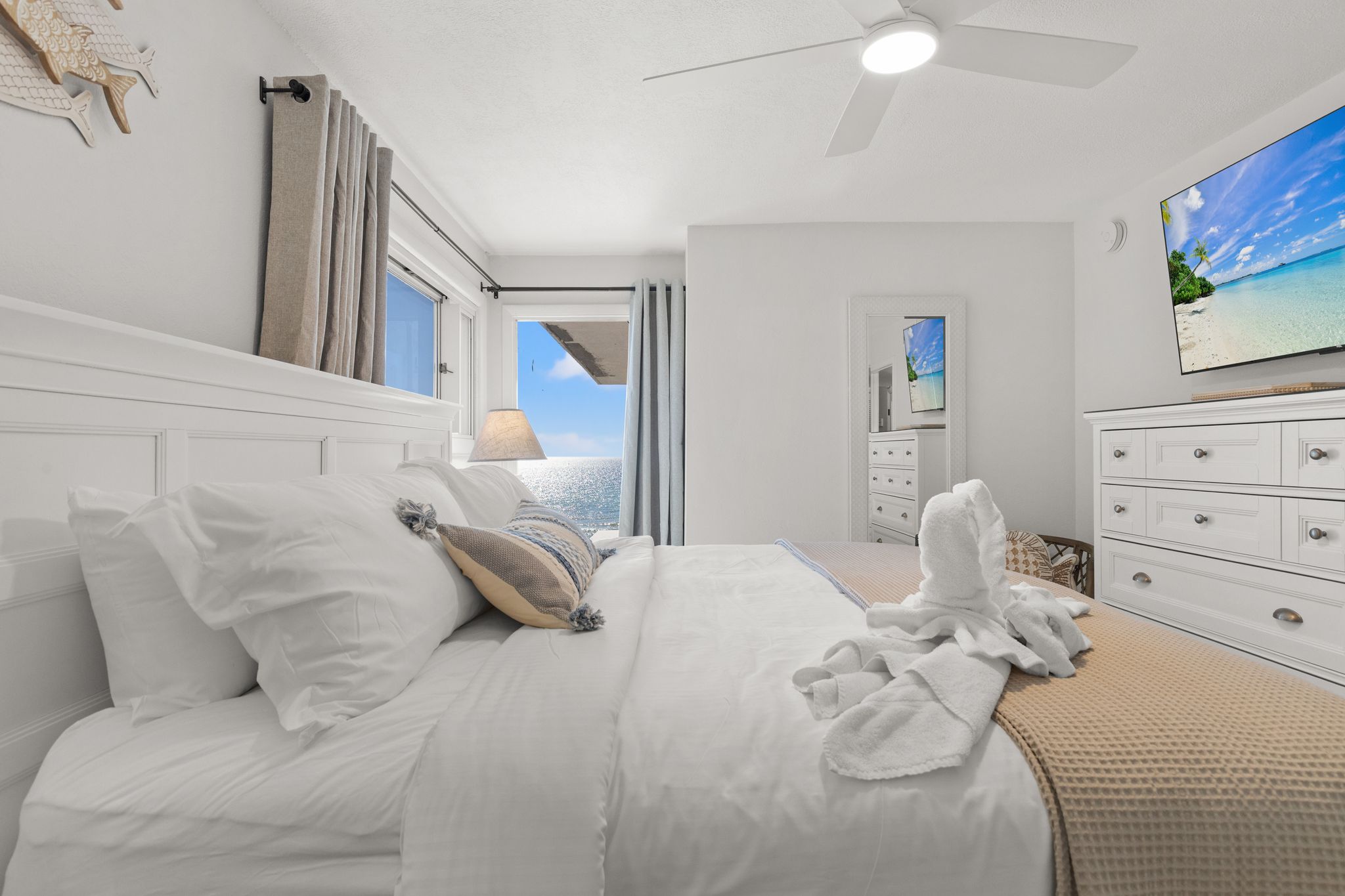 This primary suite is a true showstopper—king bed, breathtaking Gulf view, and the kind of sunrise glow that fills the room as the sun comes up. Finished with plush, luxury bedding, it’s a private retreat that feels like a high-end coastal resort.