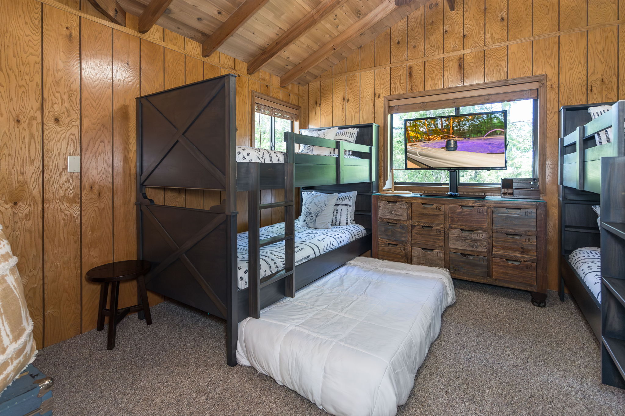 Additional floor mattress available for kids. Just slide it out and bedding is in the closet