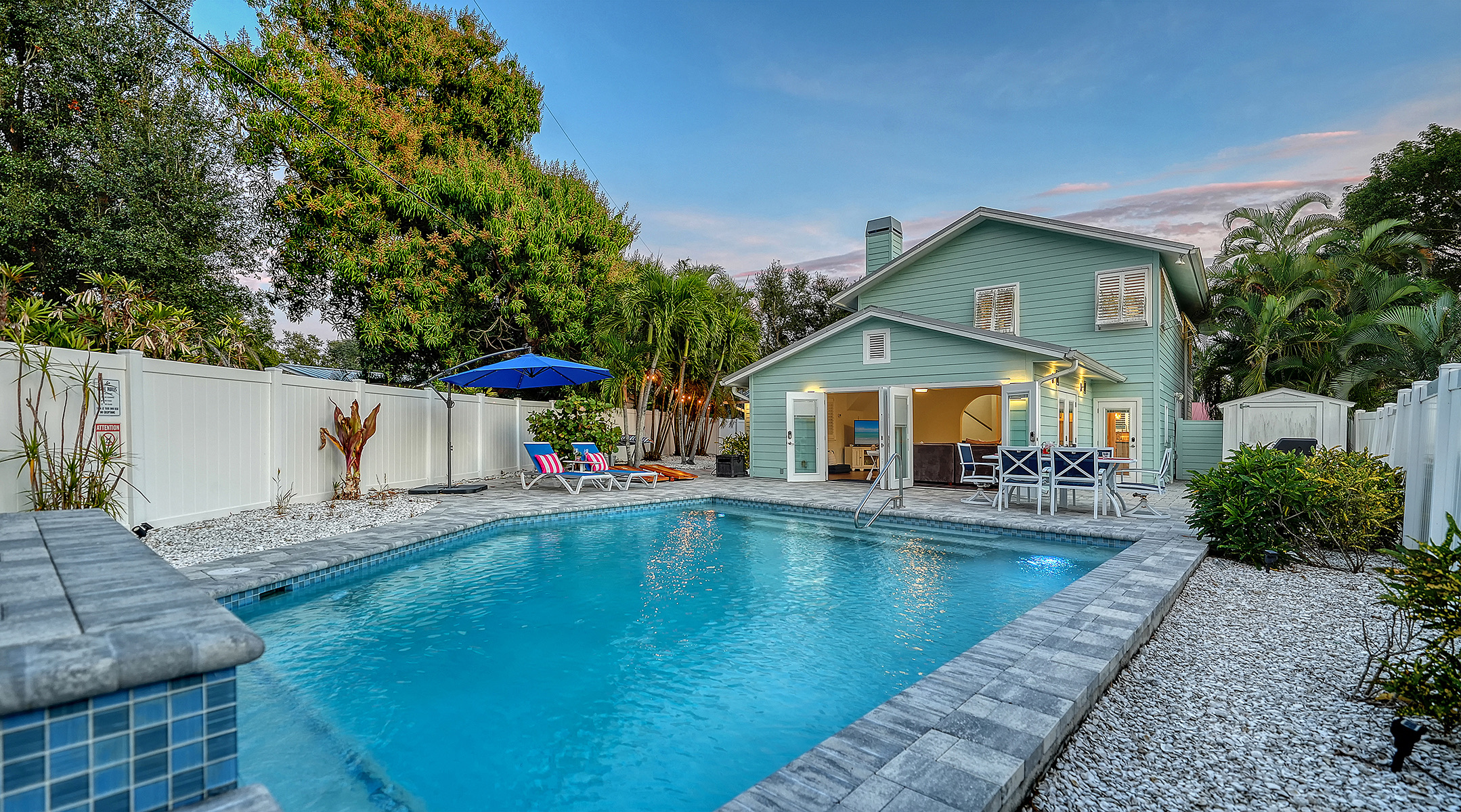 Relax in this backyard area with the waterfall!