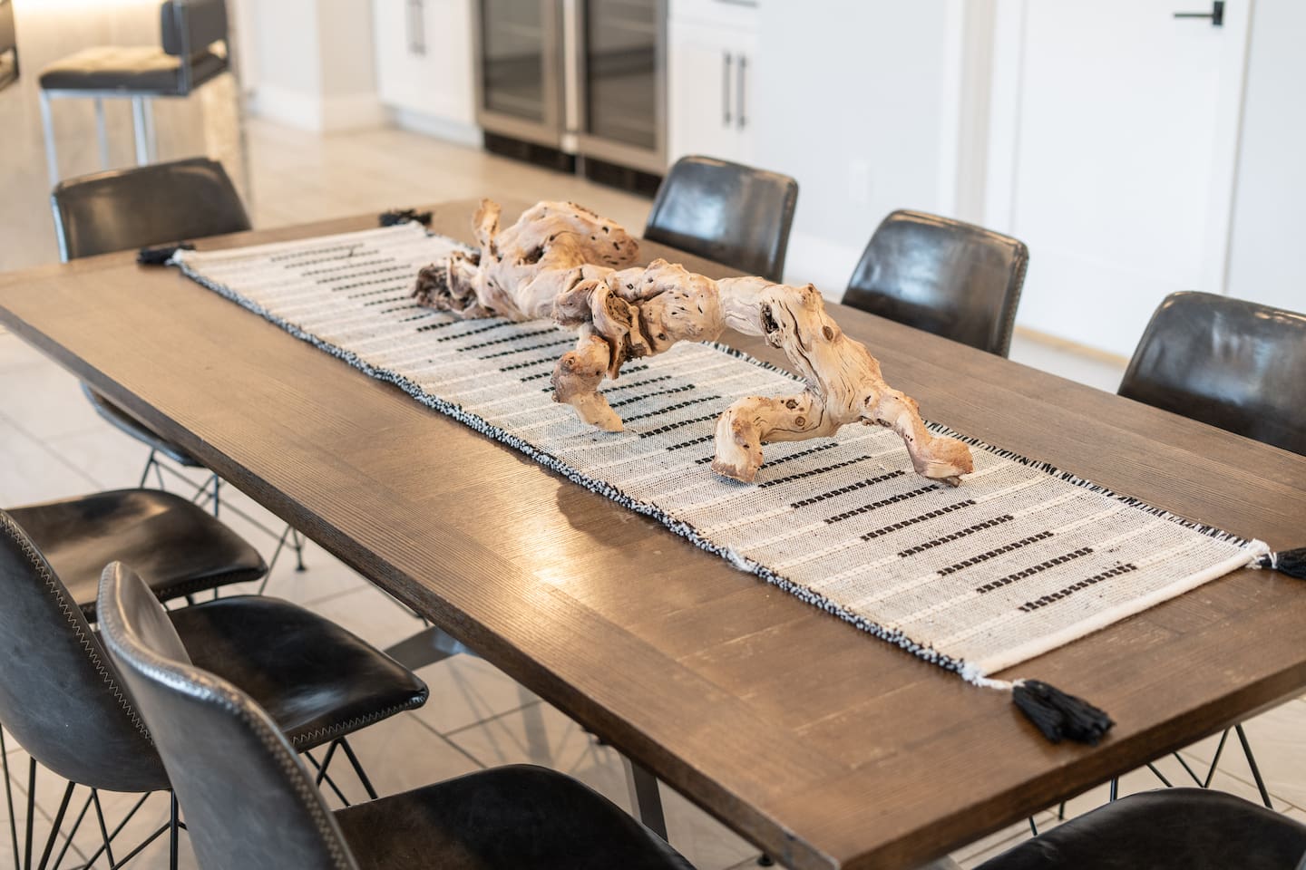 Rustic centerpiece on a refined setting.

