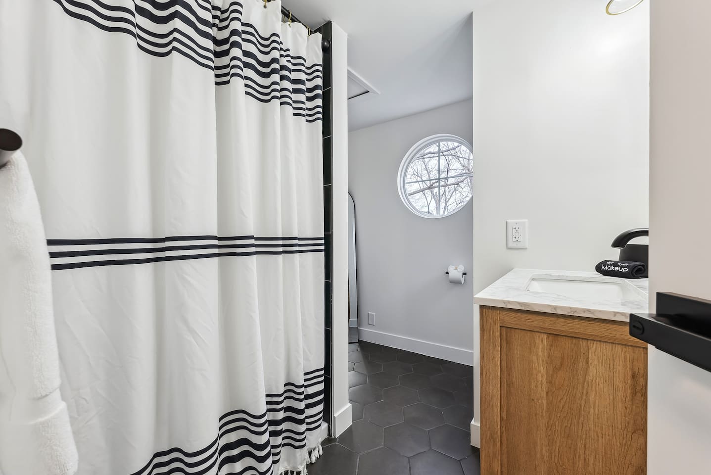 Large master bathroom with all the essentials.