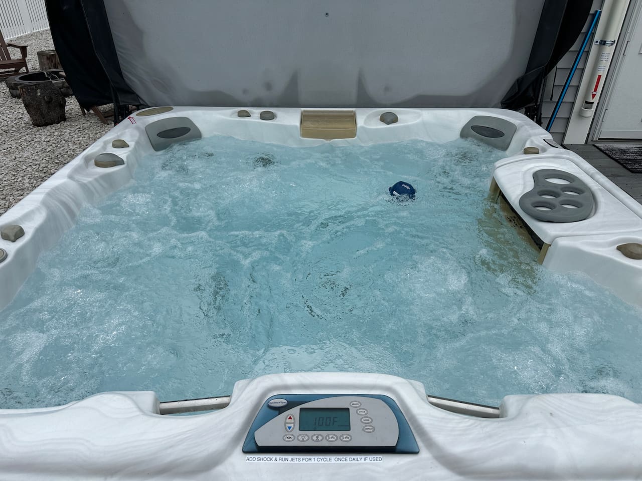 Dive into relaxation with this spacious private hot tub. Featuring multiple jets and a digital temperature display, it is the perfect spot to unwind and recharge.
