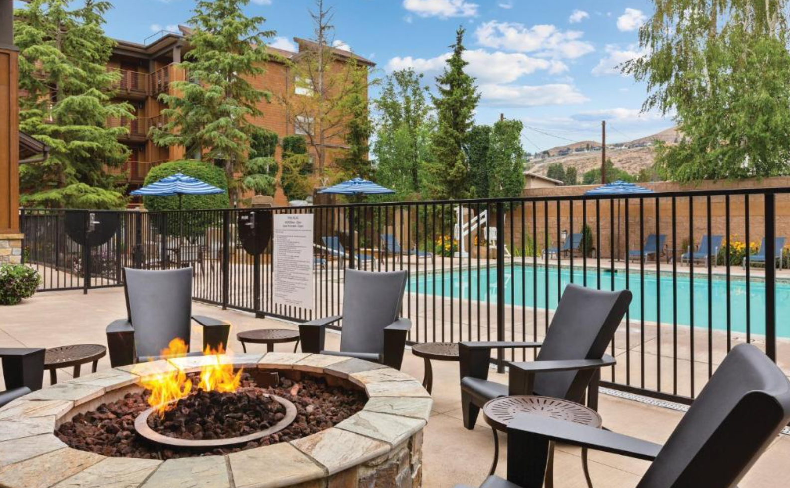 Fire table and outdoor swimming pool