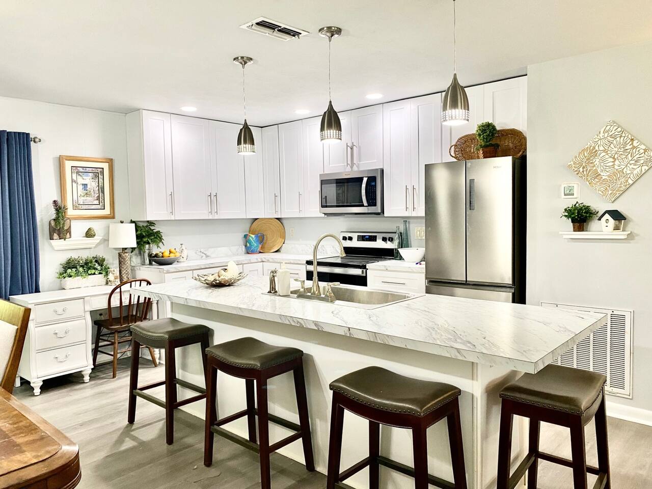 A great open concept updated kitchen to gather with your group and enjoy meals!