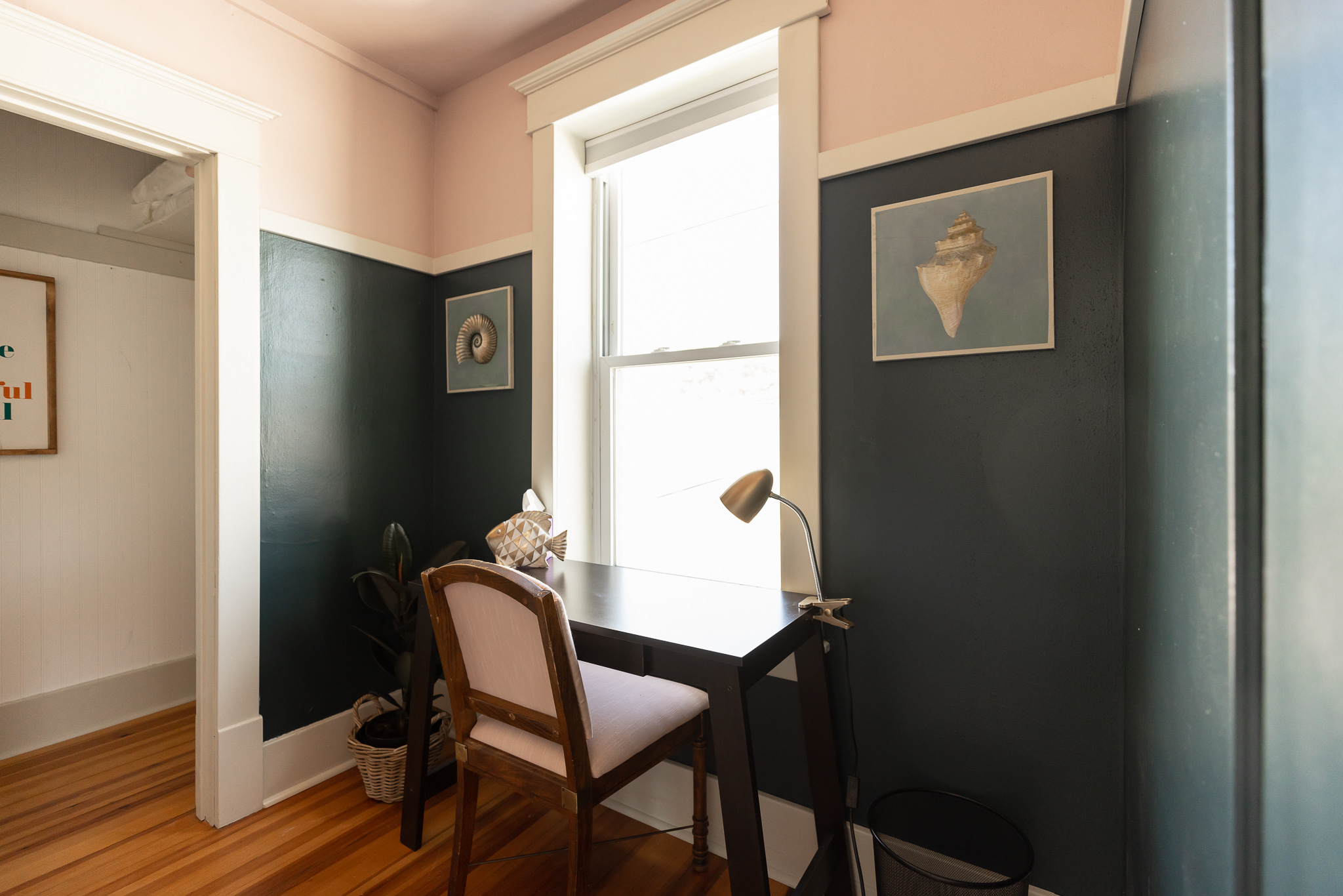 Dedicated work space overlooking Main St with black out curtains if you need to shut out the light or distractions.