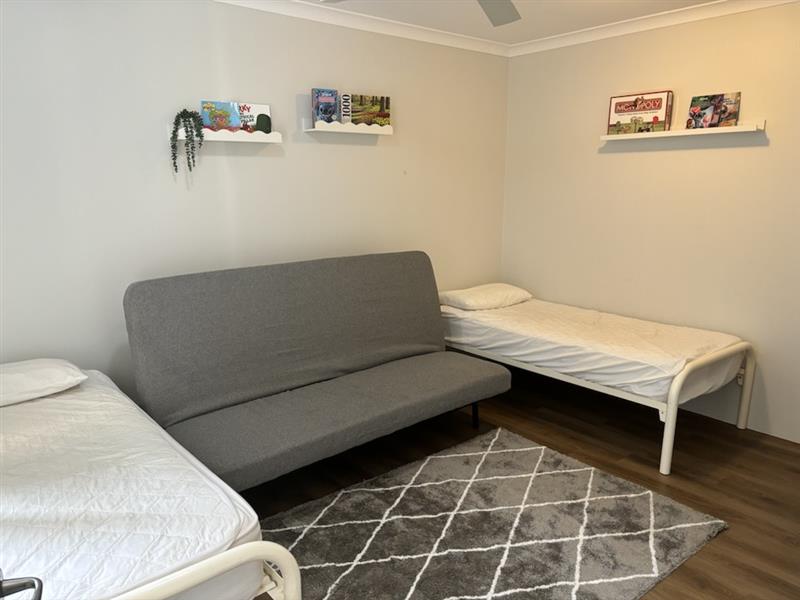 Bedroom 3 Downstairs - 2 single beds & tv on the wall