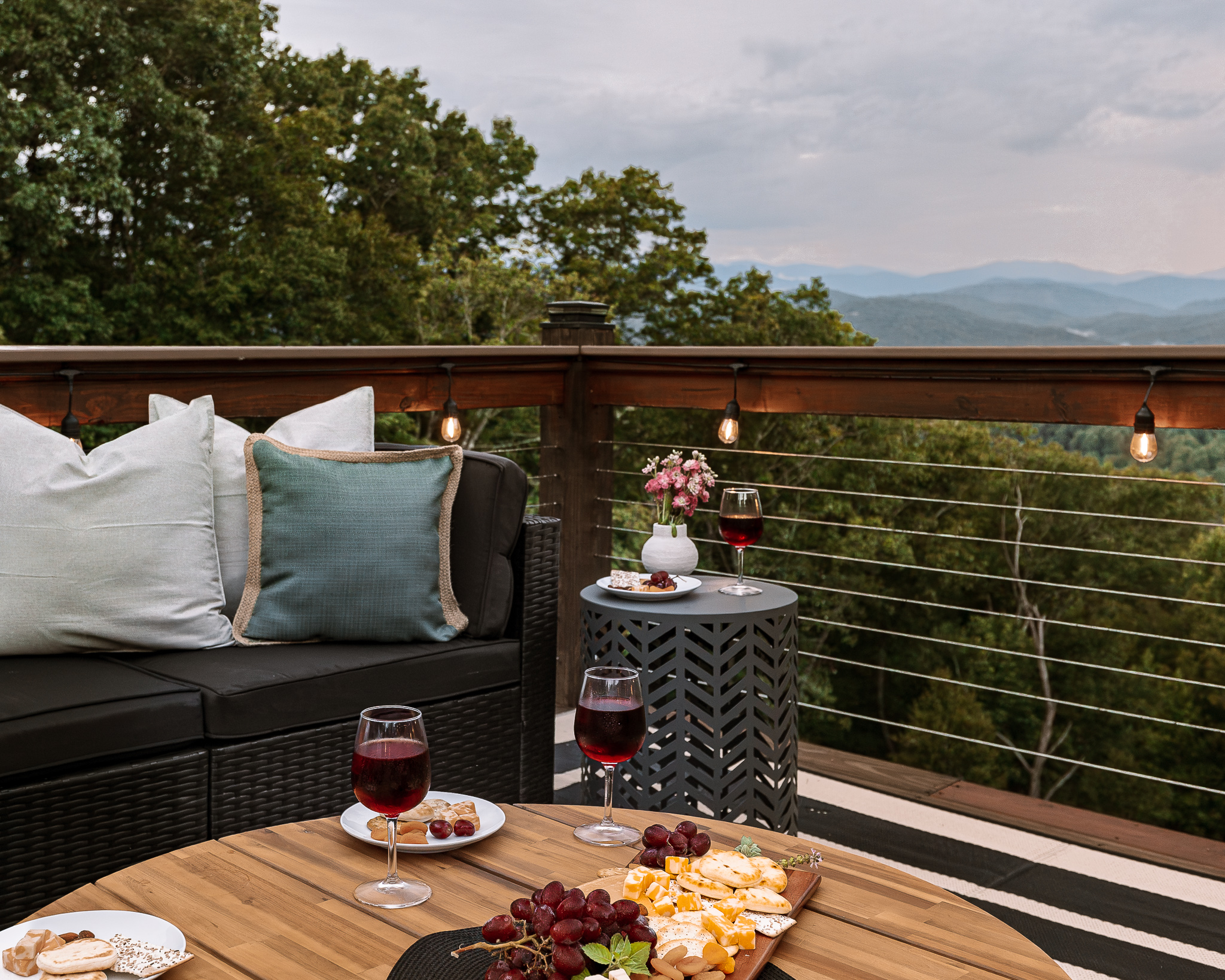 {Mountain View Deck} Pour the wine, put out a snack board, and settle in for sunset with layered Blue Ridge Mountain views beyond the deck.