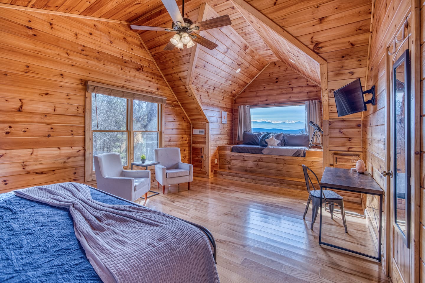 Huge window & amazing mountain views from one of the 2 upstairs bedrooms, both with a sleeping nook with a twin bed (and both also have a king bed and private bathrooms).