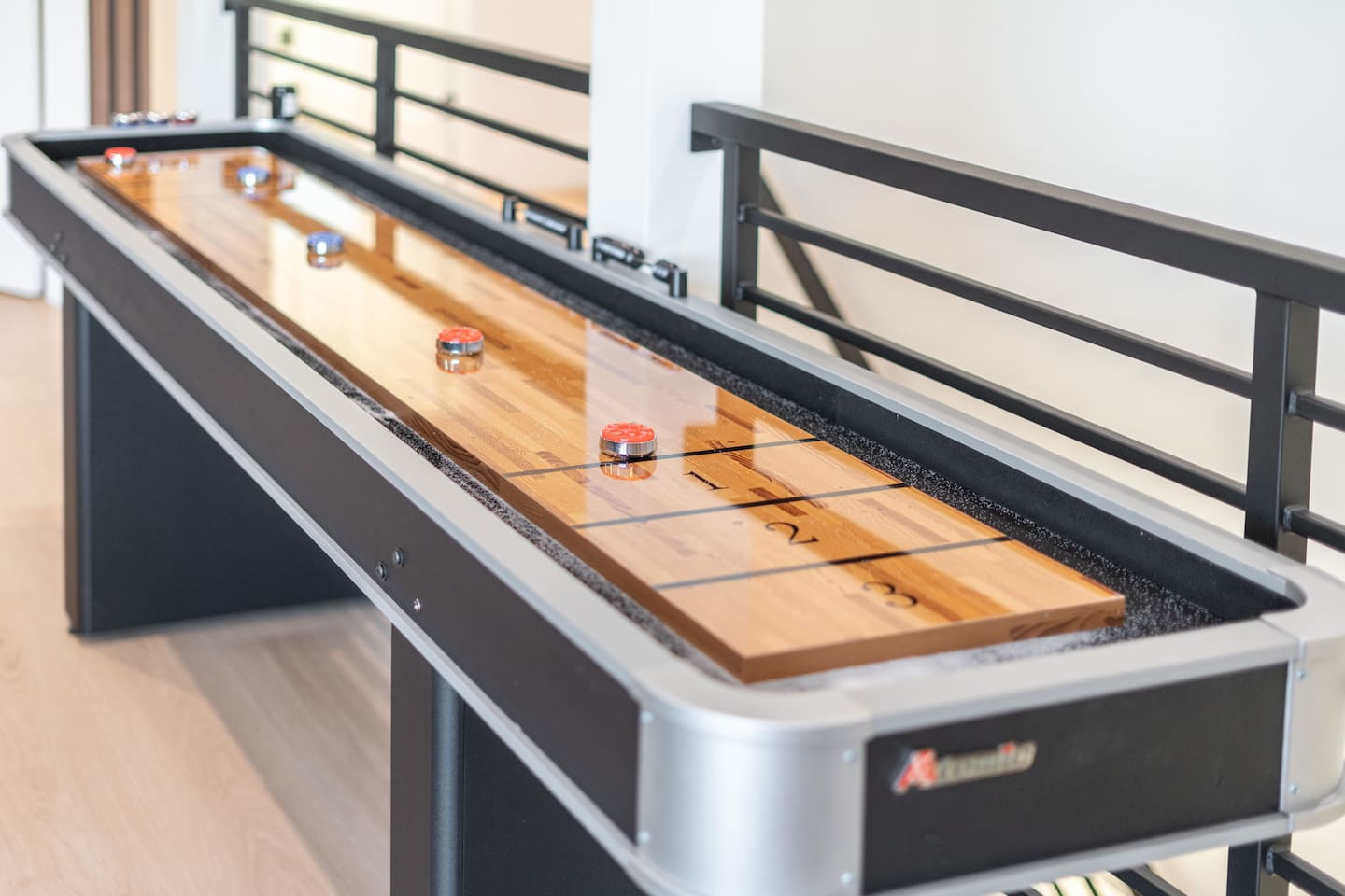A sleek shuffleboard setup for hours of entertainment.