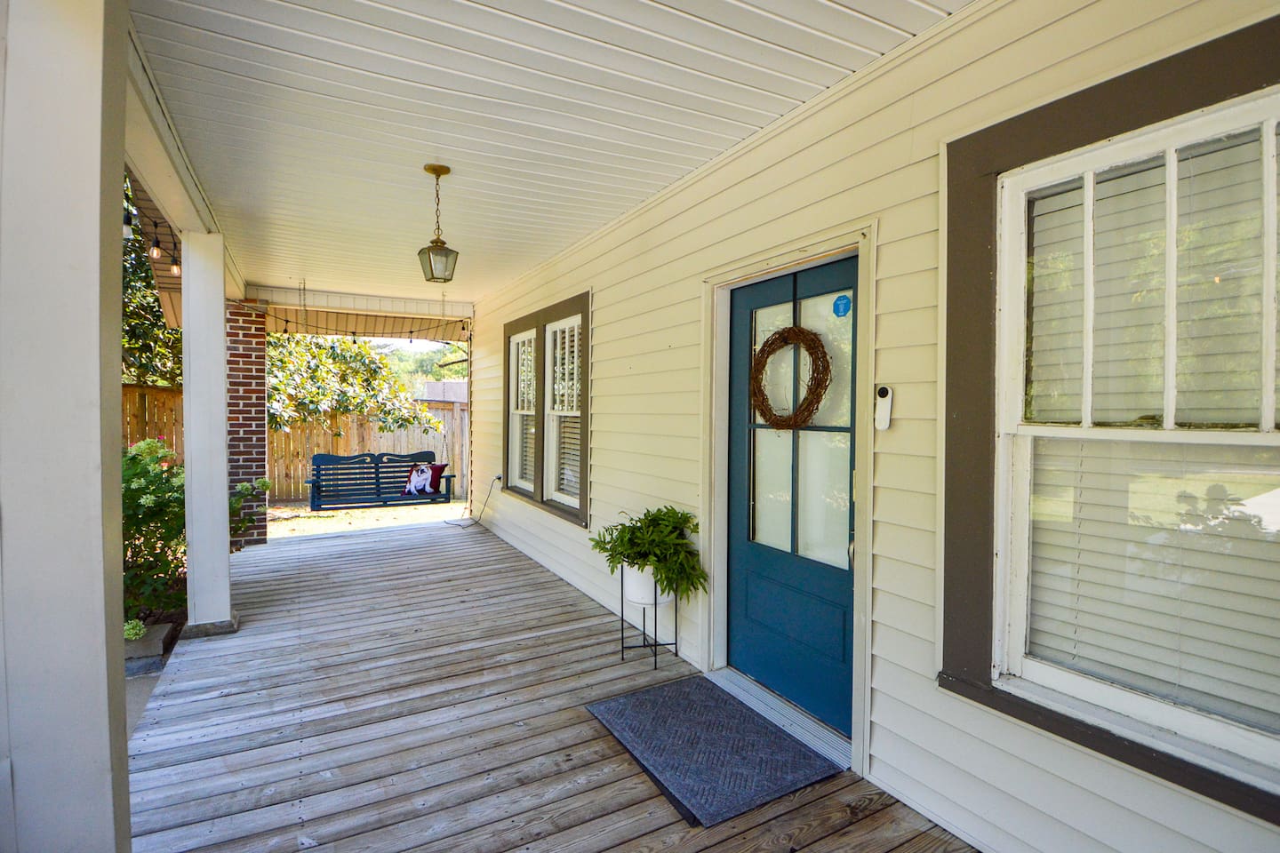 Front porch side view and porch swing