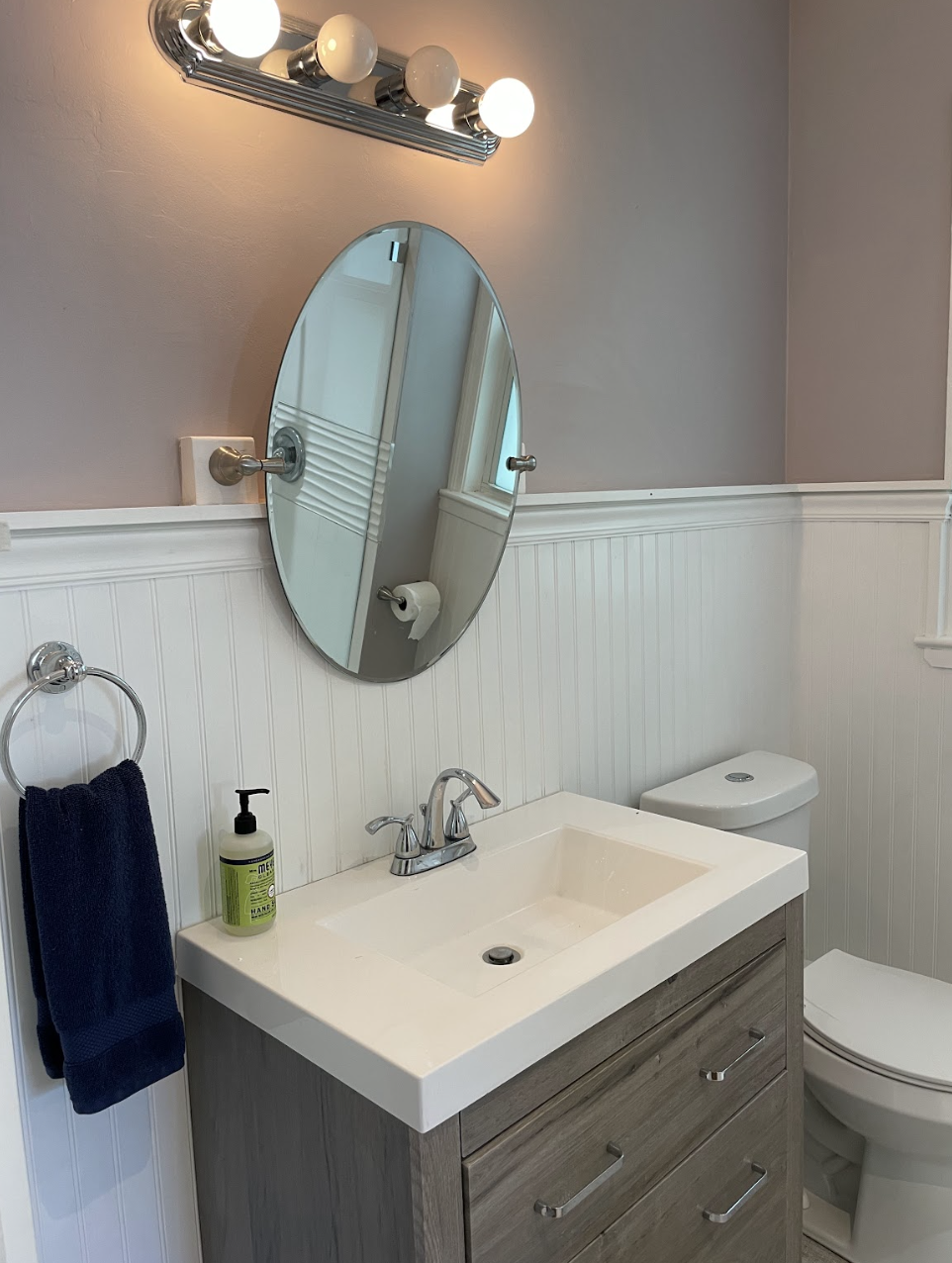The second bathroom can be accessed from the hallway or the bedroom, and is completely renovated with a new shower.
