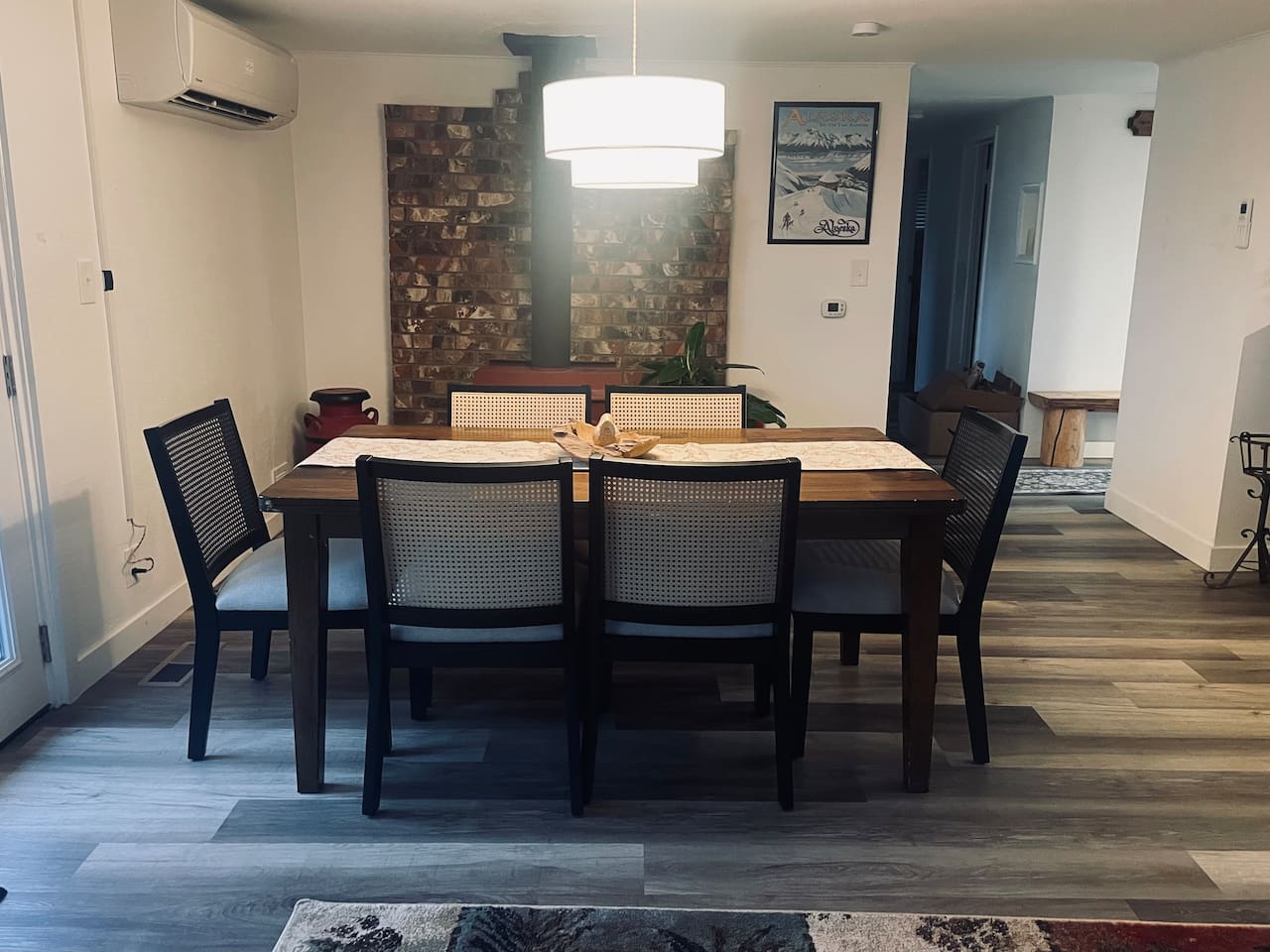 A table for six invites shared moments, where light and space come together to frame conversation and connection.