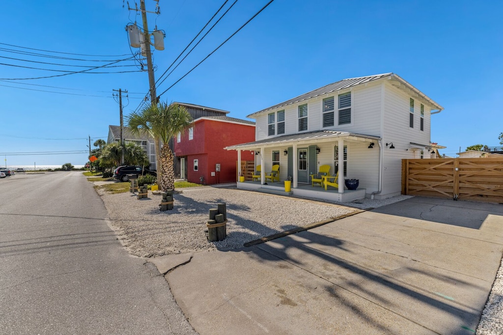 The house is the third lot from the ocean, which can be seen here at the end of the street.