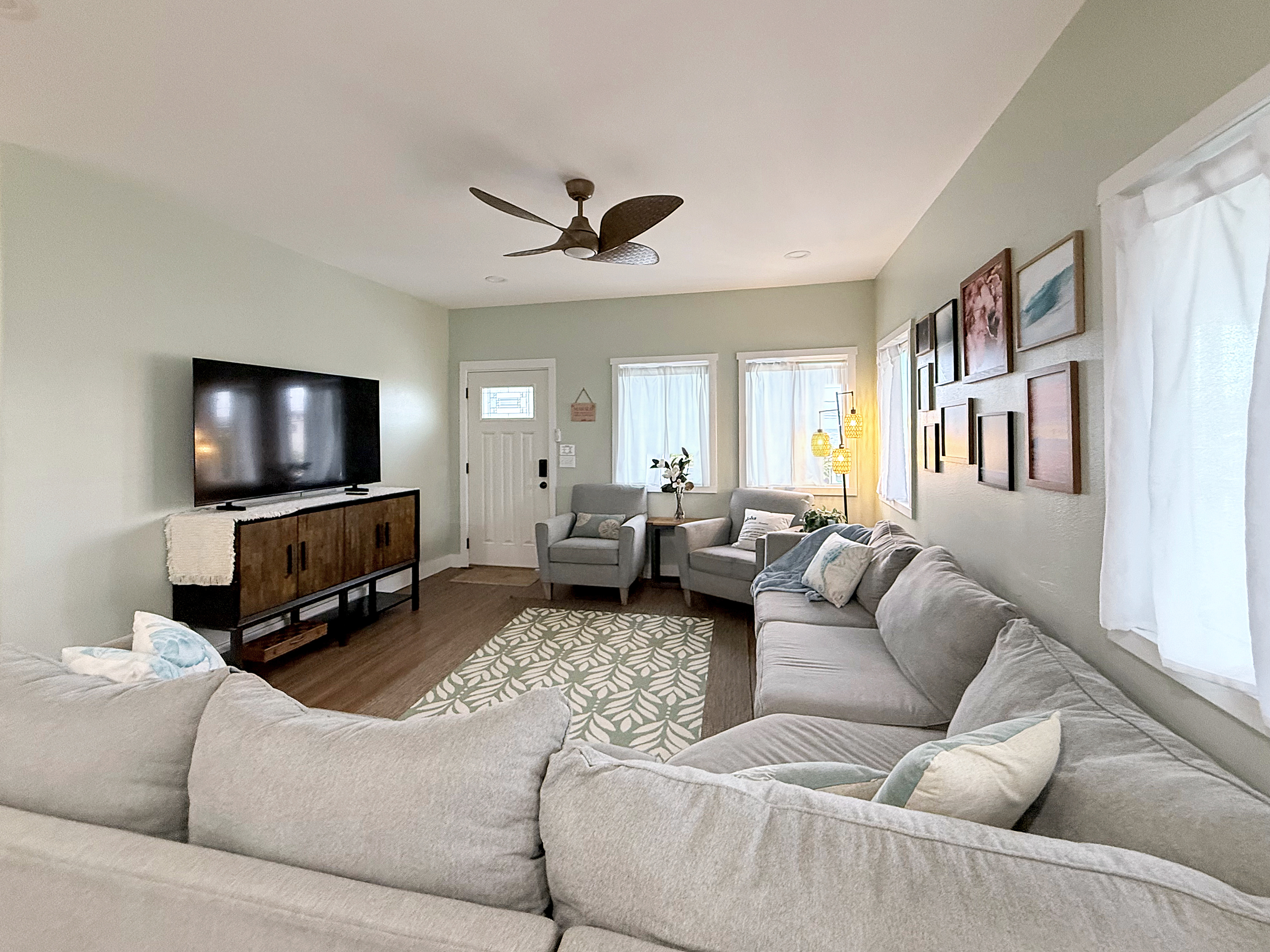 Living Room | Representative Interior. Finishes, decor, and furniture, vary by unit.