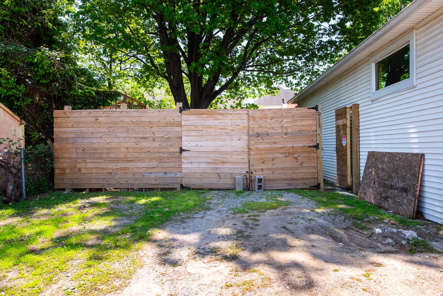 Parking area in the back. Enter from Barret Ave or the alley. 