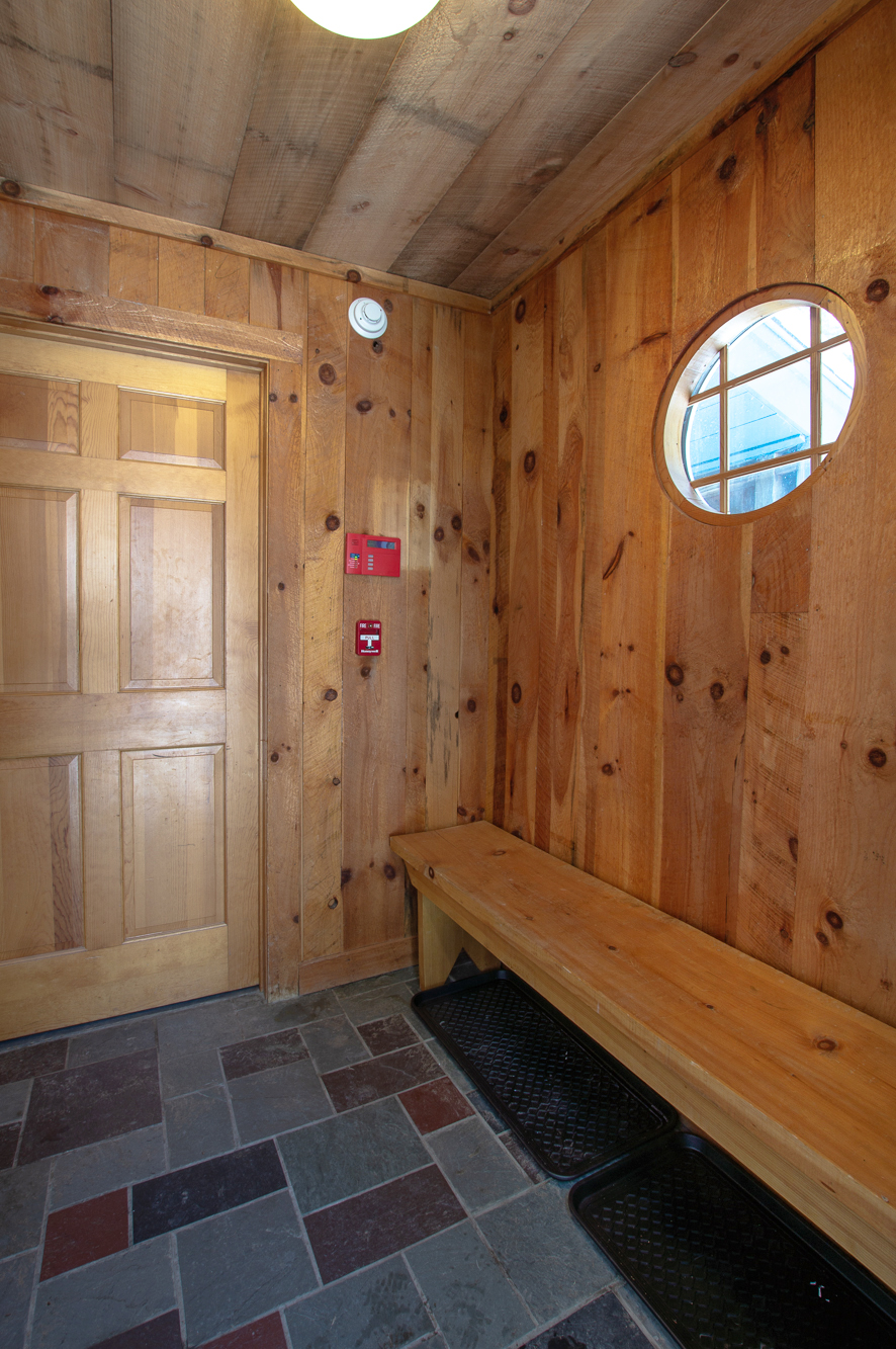 Wood finished walls create a cozy feel