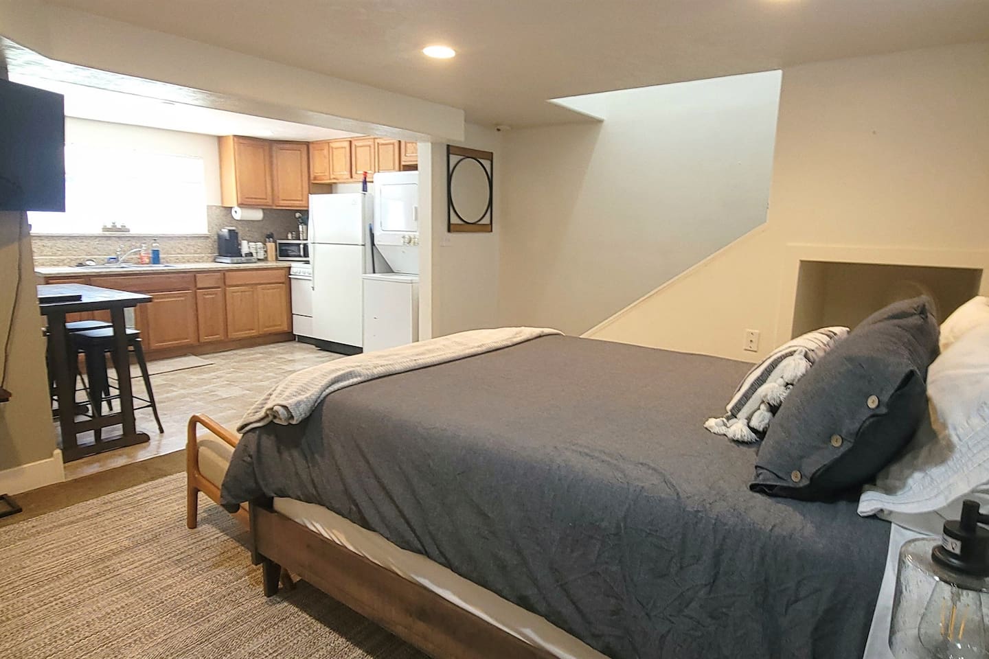 View from bed into kitchen