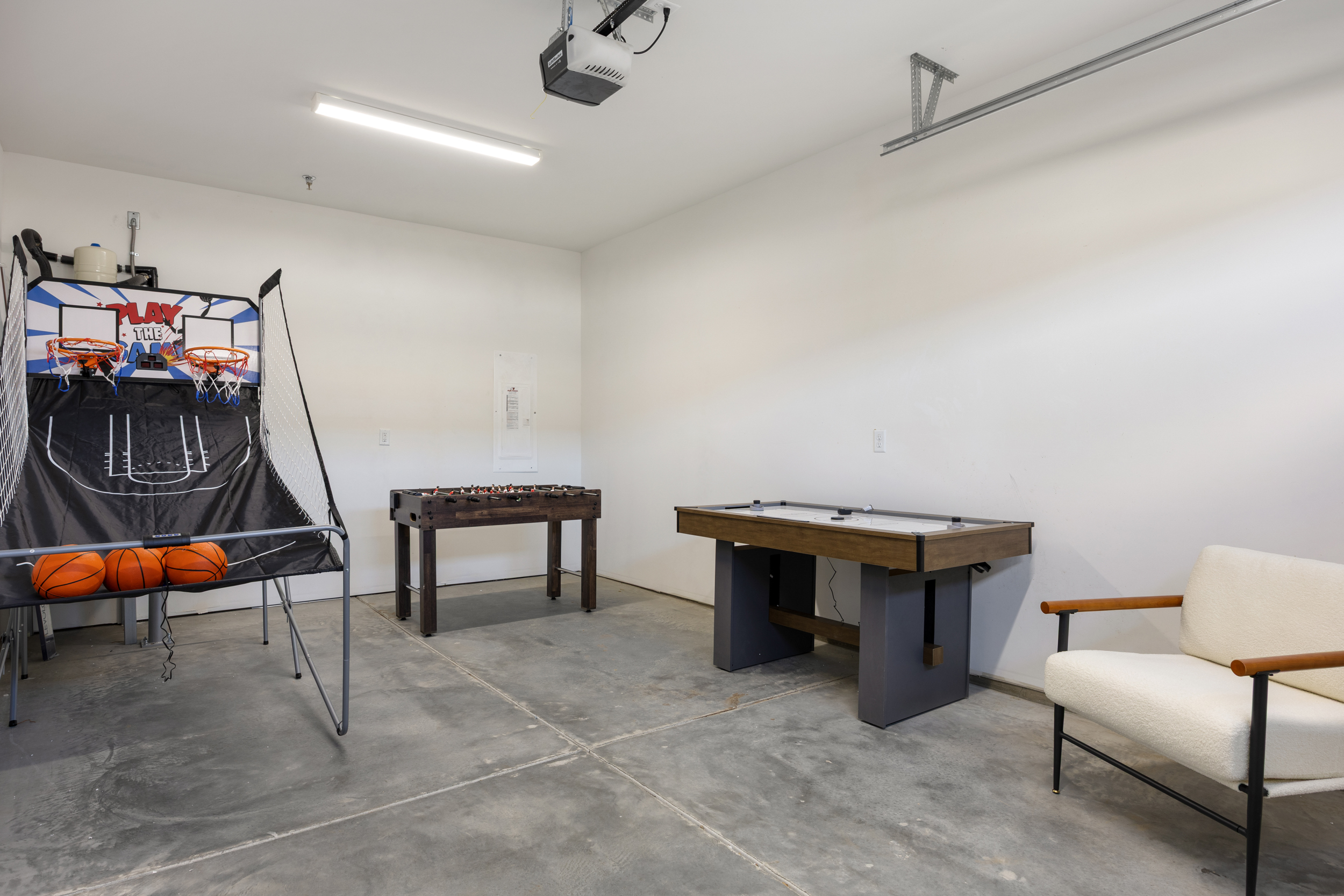 Game room located in Garage | Basketball | Foosball | Air Hockey