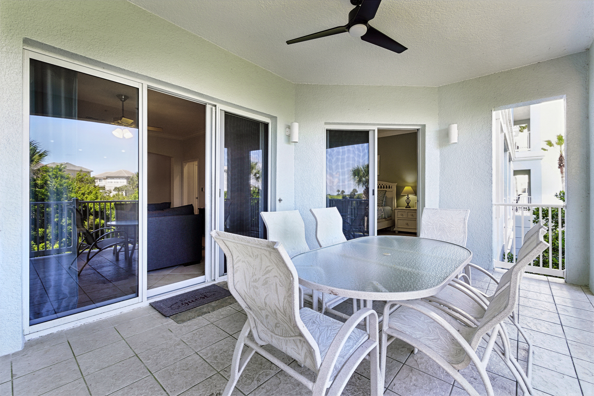 A perfect shaded balcony for morning coffee or sunset drinks—complete with a ceiling fan, comfy seating, and peaceful tropical views. 🌴☕🌅
