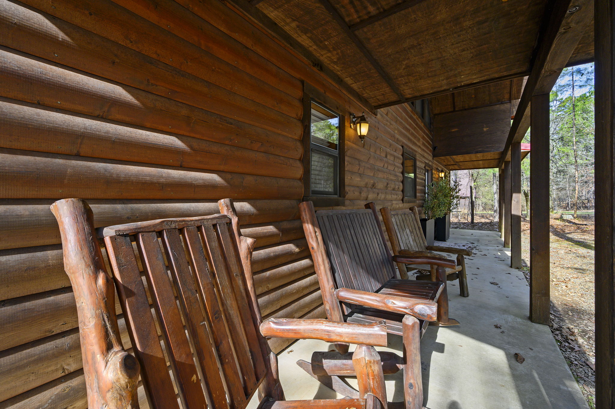 Classic cabin architecture surrounded by nature; a refined mountain escape designed for comfort from the moment you arrive.