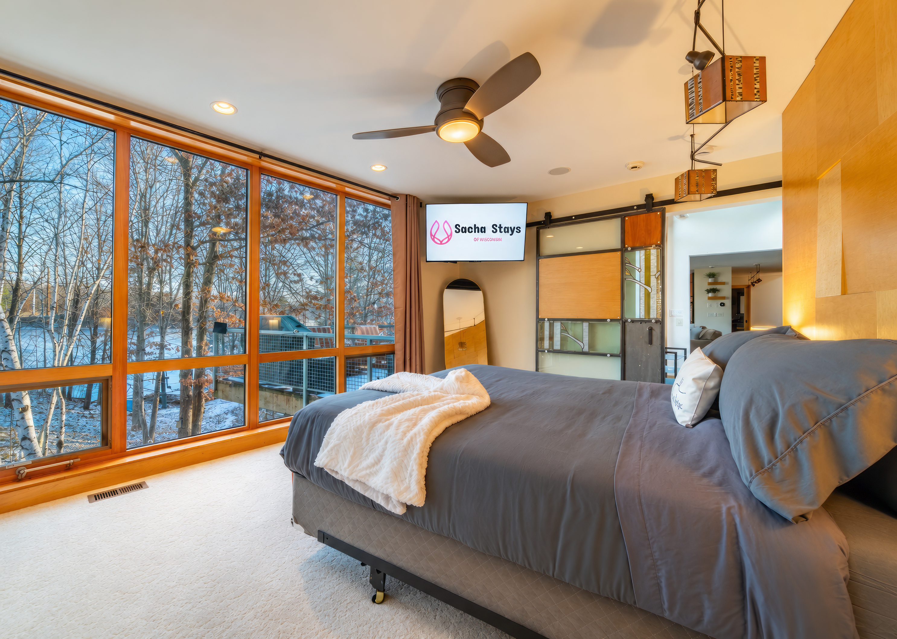 Imagine waking up to these amazing lake views from the floor to ceiling windows!