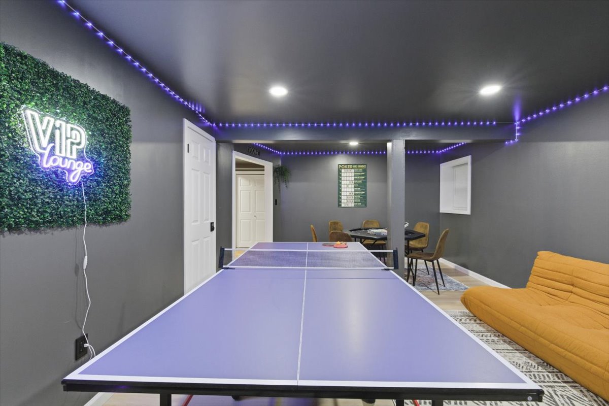 Ping pong and a hang out area complete the downstairs game room