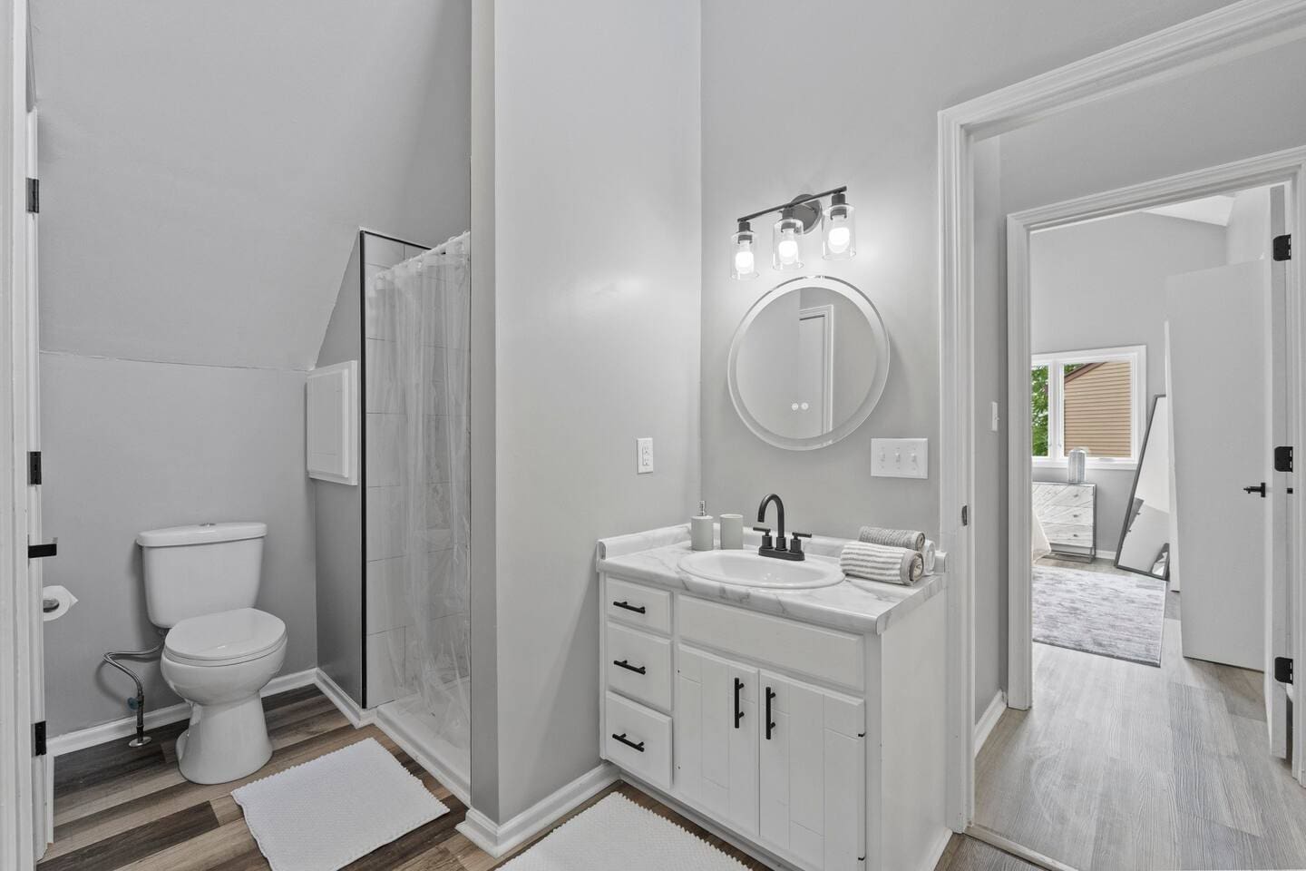 Convenient bathroom featuring direct access from the bedroom, offering a seamless and private experience.