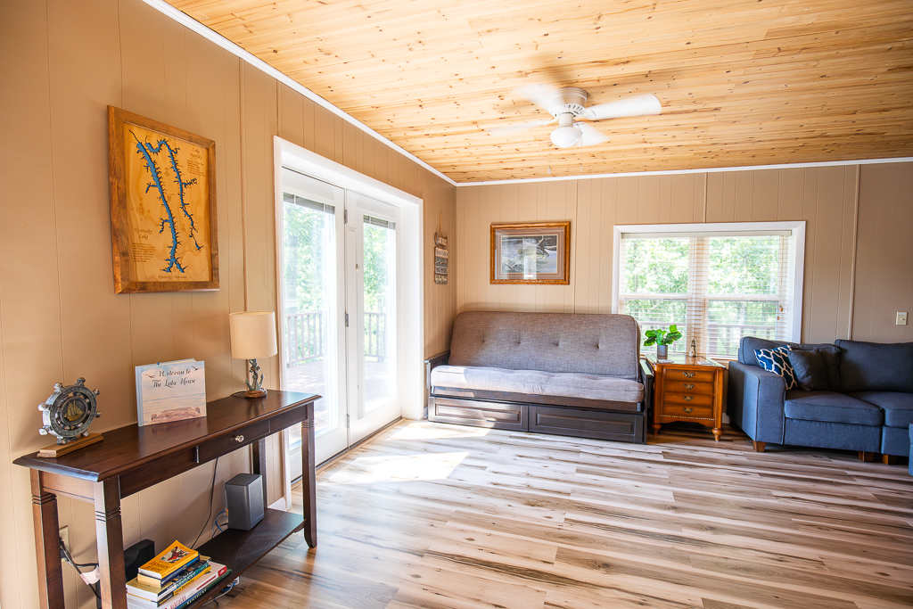 Settle in with family and friends in this warm and inviting living room, perfect for movie nights or quiet mornings with coffee