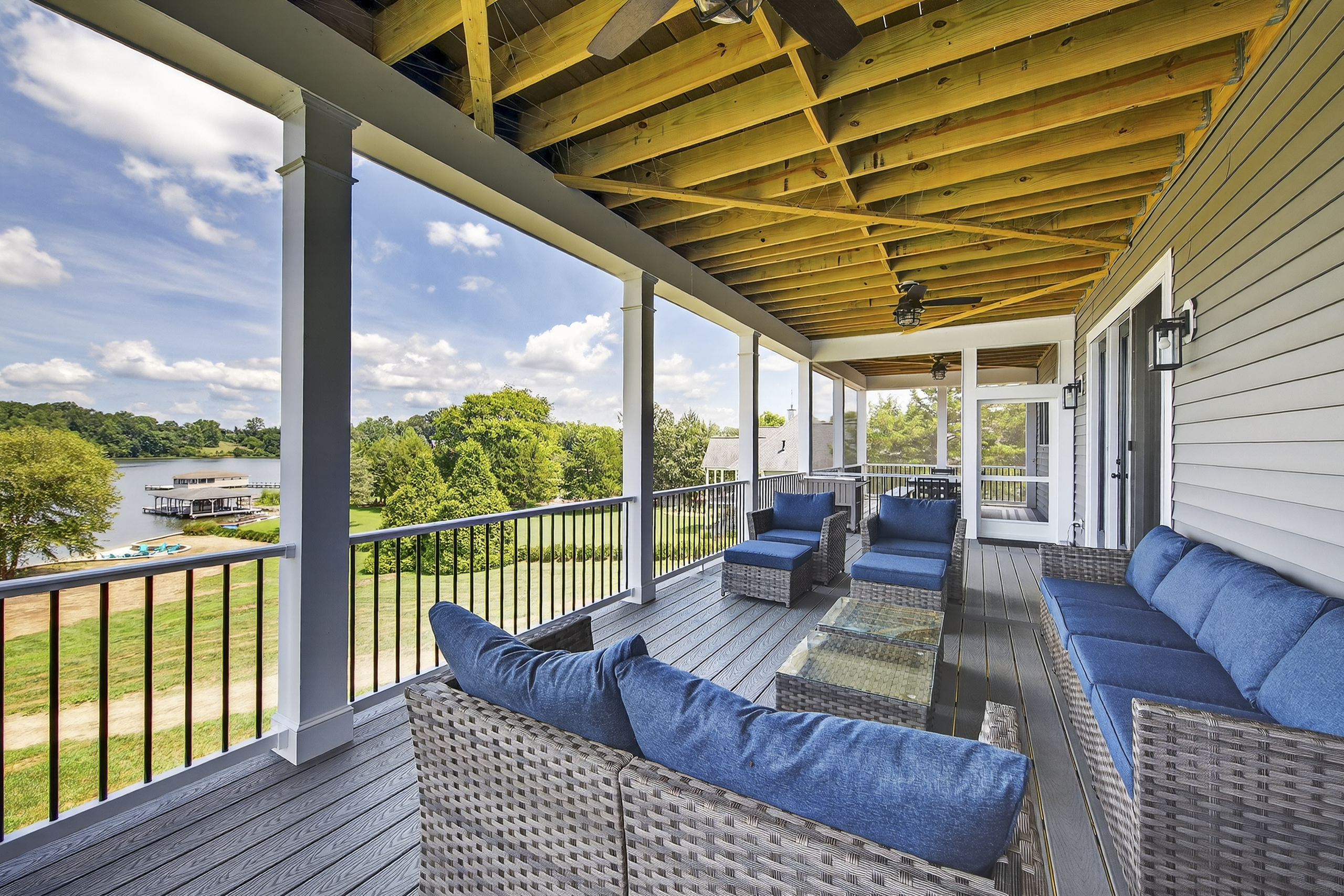 Soak up the view from plush seating in this breezy, covered lounge.