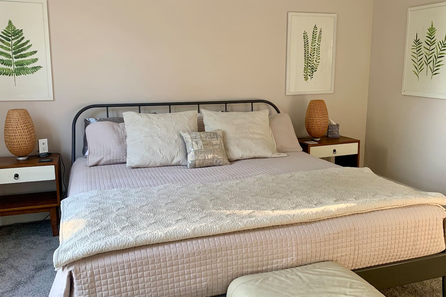 Comfort is a brand standard at The Urban Chalet - King bed with organic cotton lines, soft ambient lighting, and blackout shades designed for deep rest, and longer stays. 