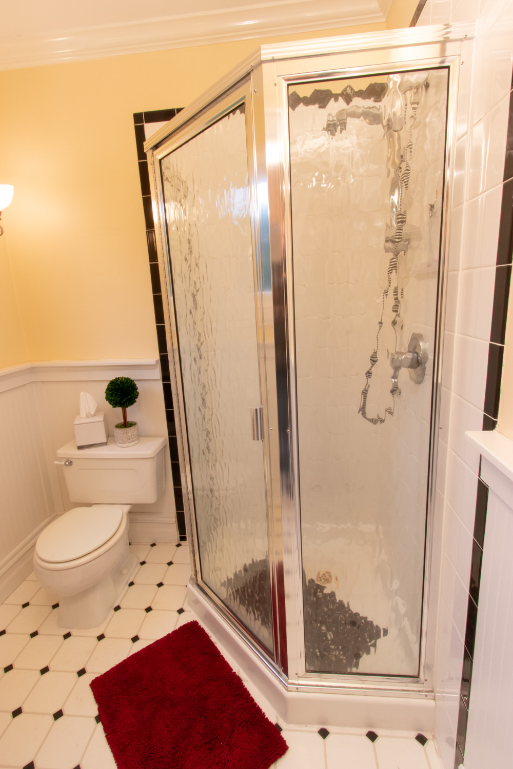 Bathroom #1of 2: Main floor with walk in-shower and washer & dryer