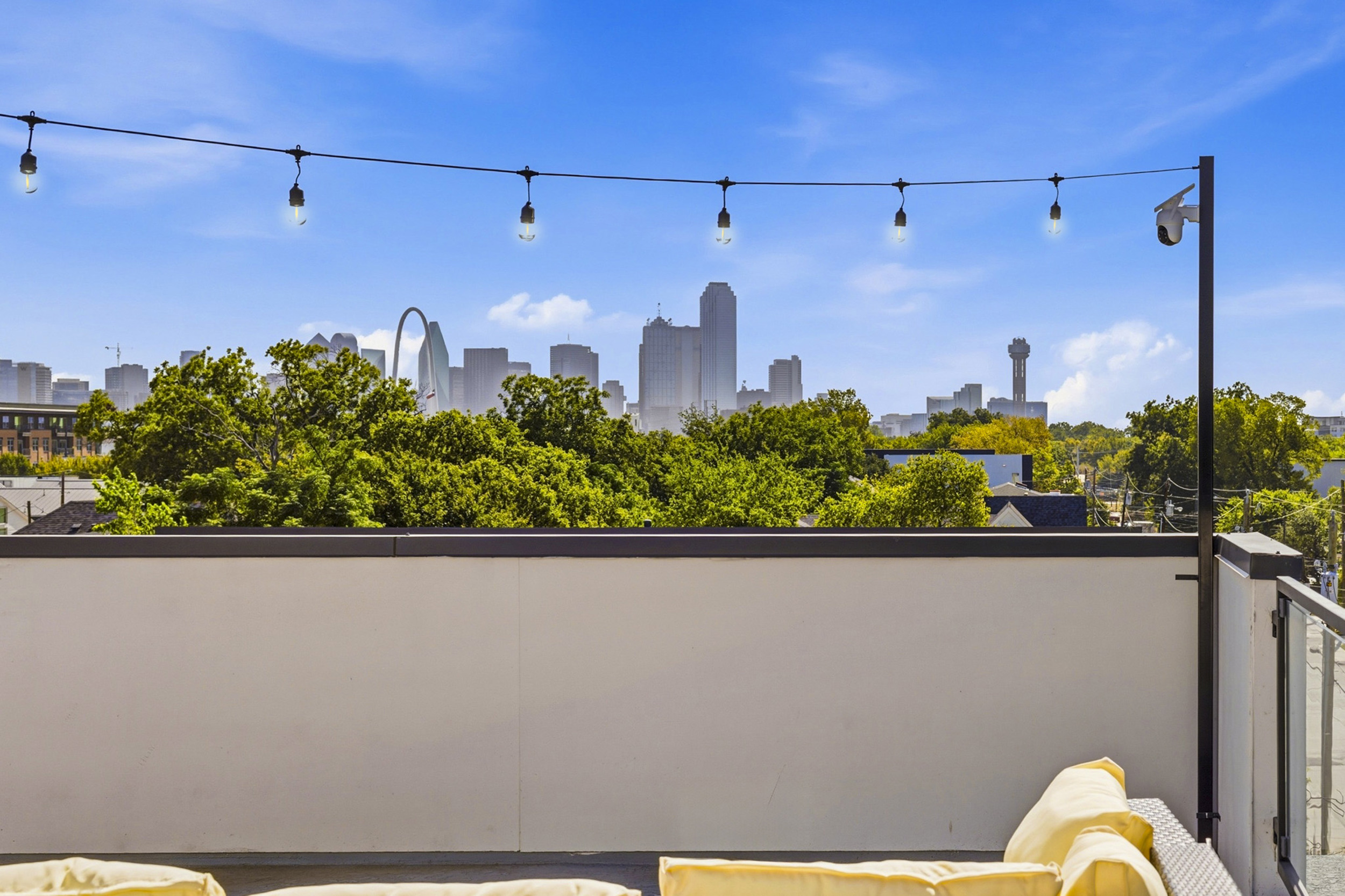 Savor stunning skyline views under twinkling lights your oasis in Dallas!