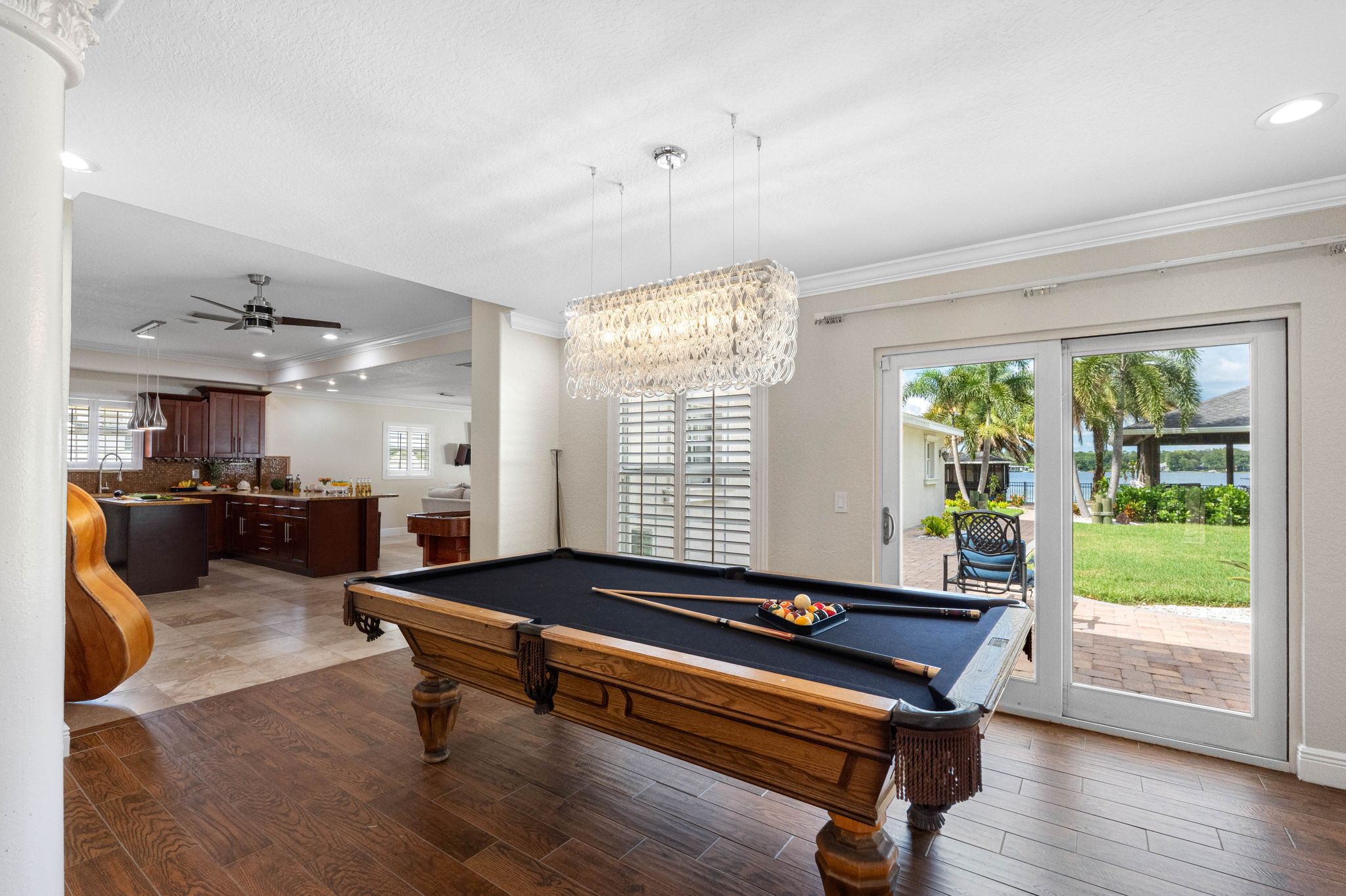 At the center of this fun-filled space is a full-size pool table, ready for everything from casual practice shots to exciting tournaments with family and friends.
